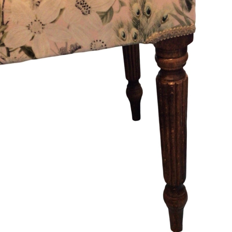 This bench is covered in gorgeous light pink velvet fabric with green peacocks, green butterflies, green foliage and white flowers and is finished with cream binding and mahogany legs.