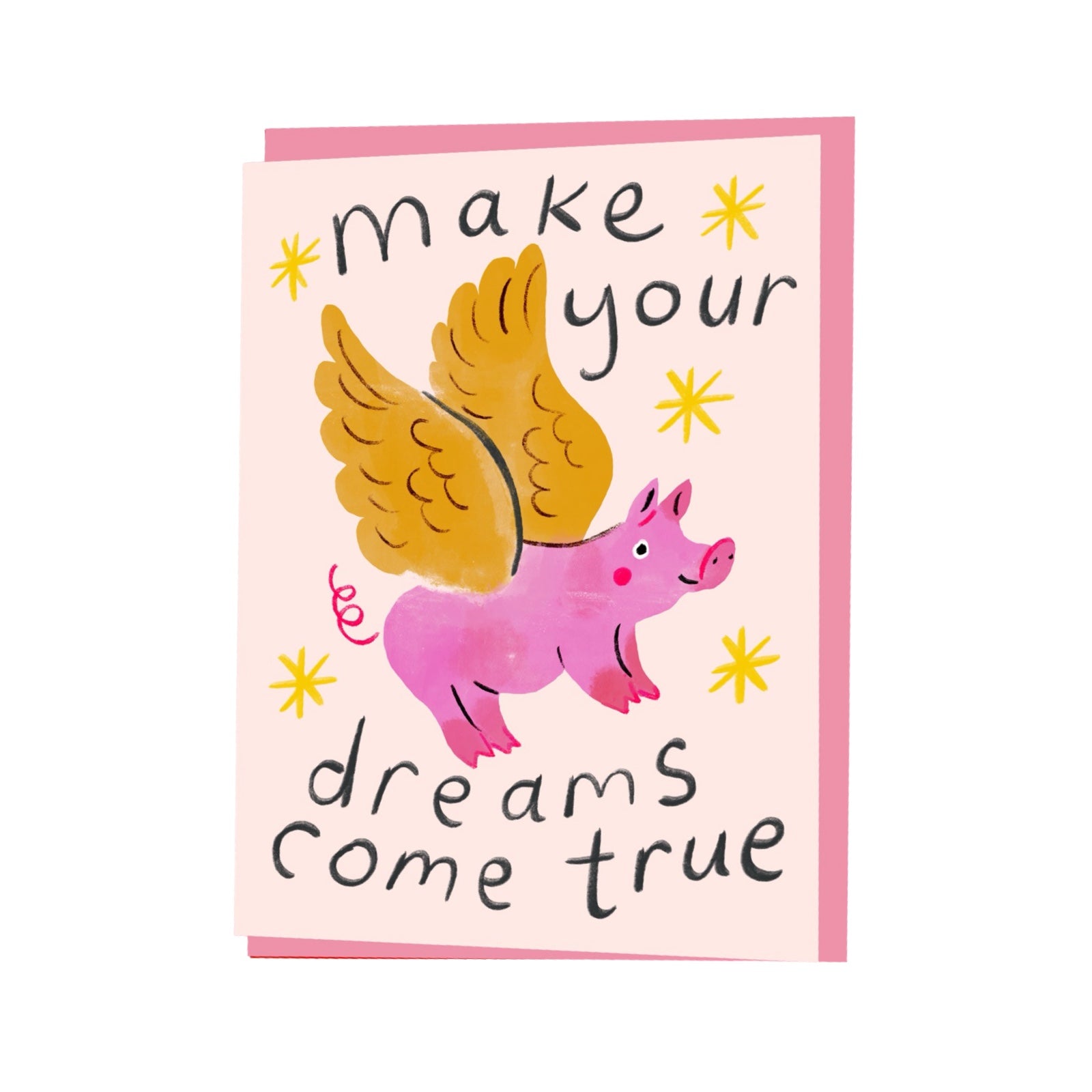 Card featuring a flying pink pig with gold wings and the text' make your dreams come true'.