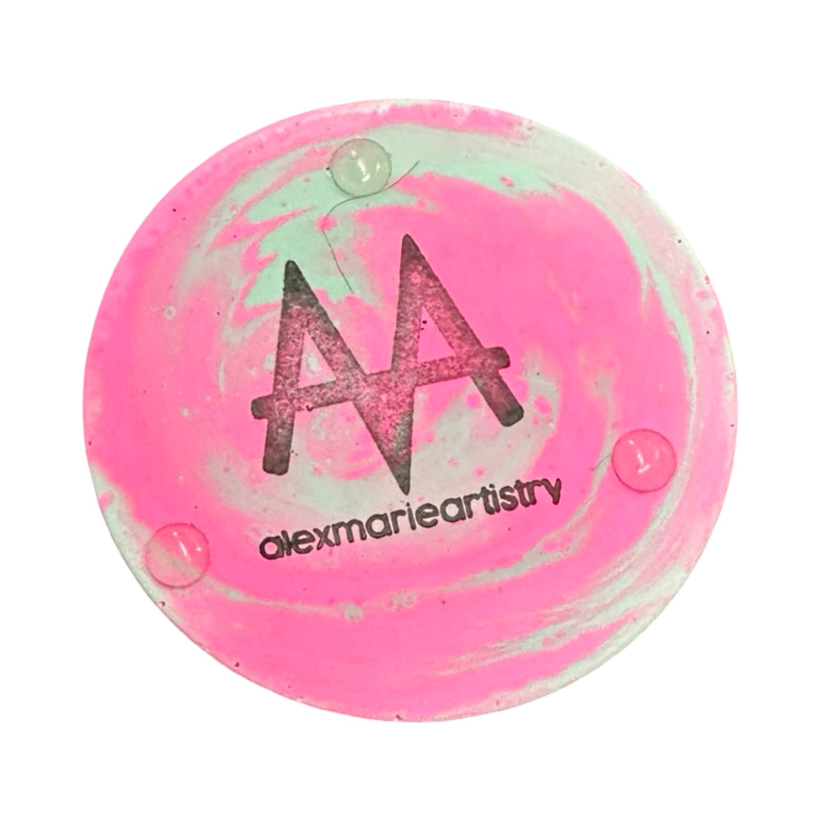 Pink and green marbled bottom of planter with 'alexmarieartistry' logo on a white background.