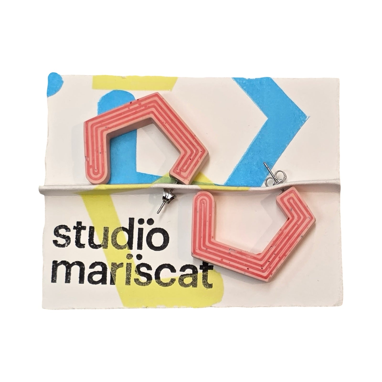 Pink chunky hexagon hoop earrings with red stripes.