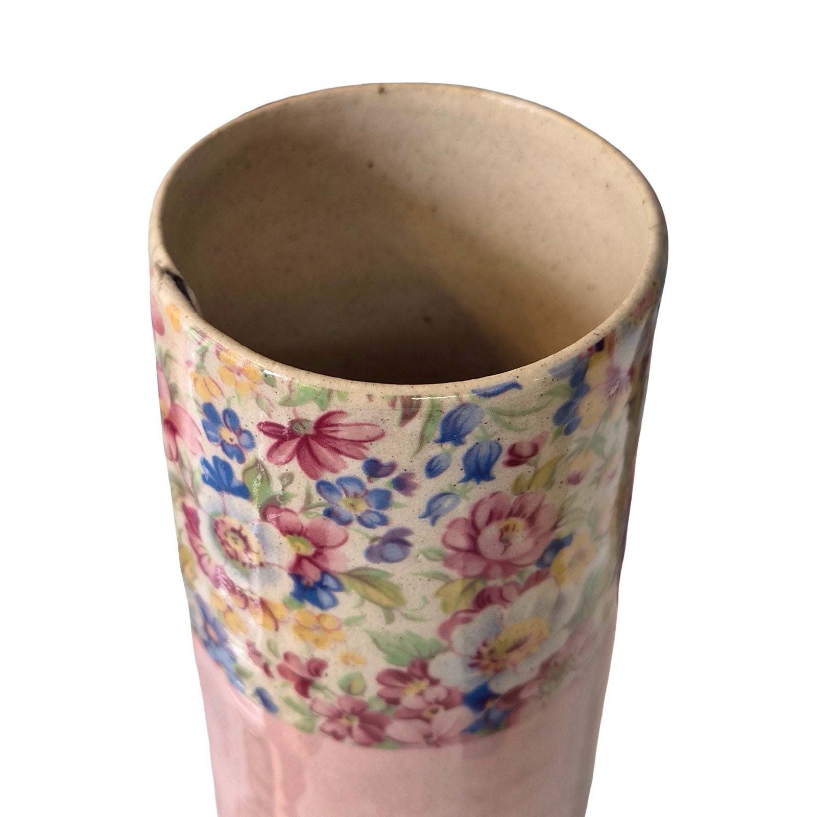 Ceramic vase with floral pattern on a white background.