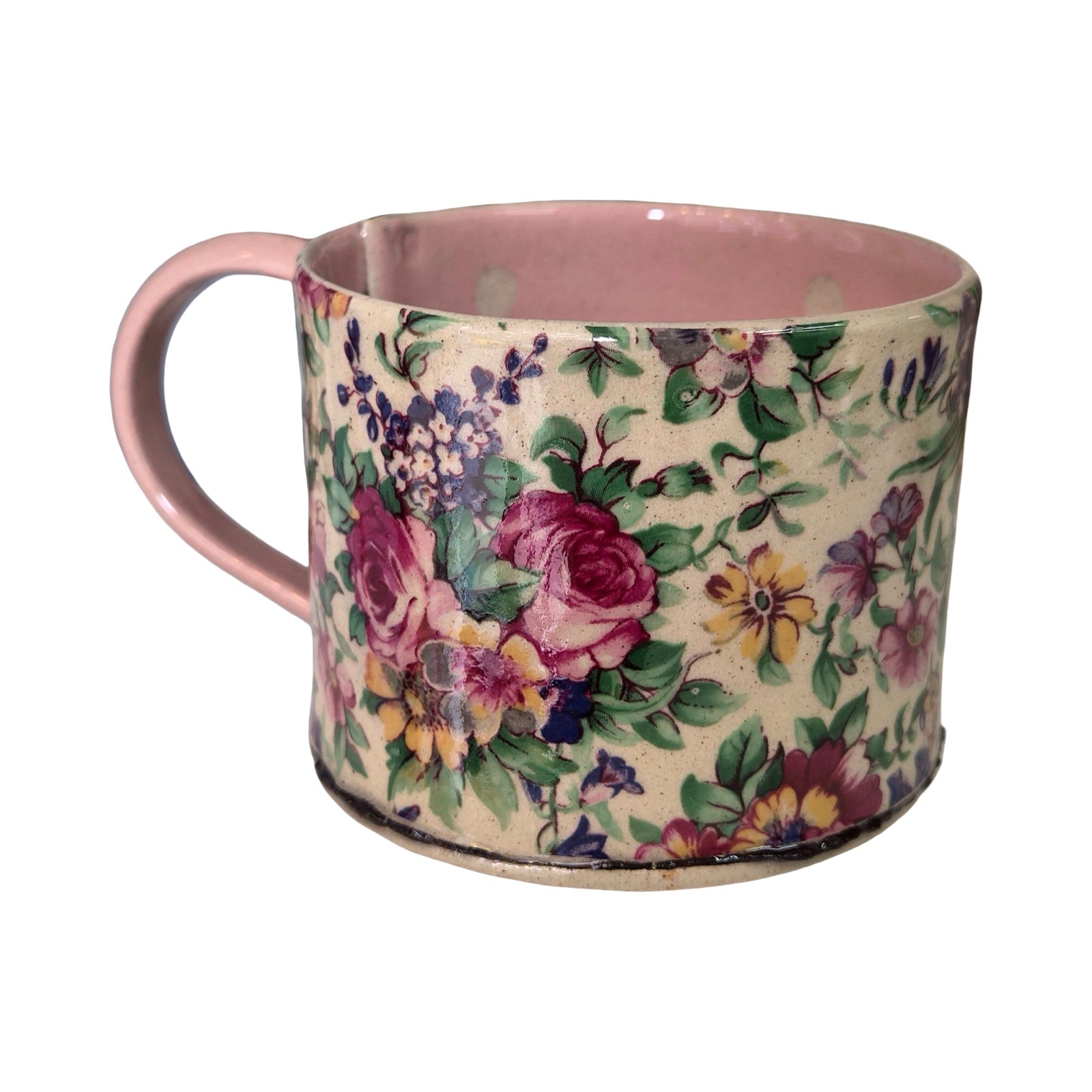 Floral-patterned mug on a white background.