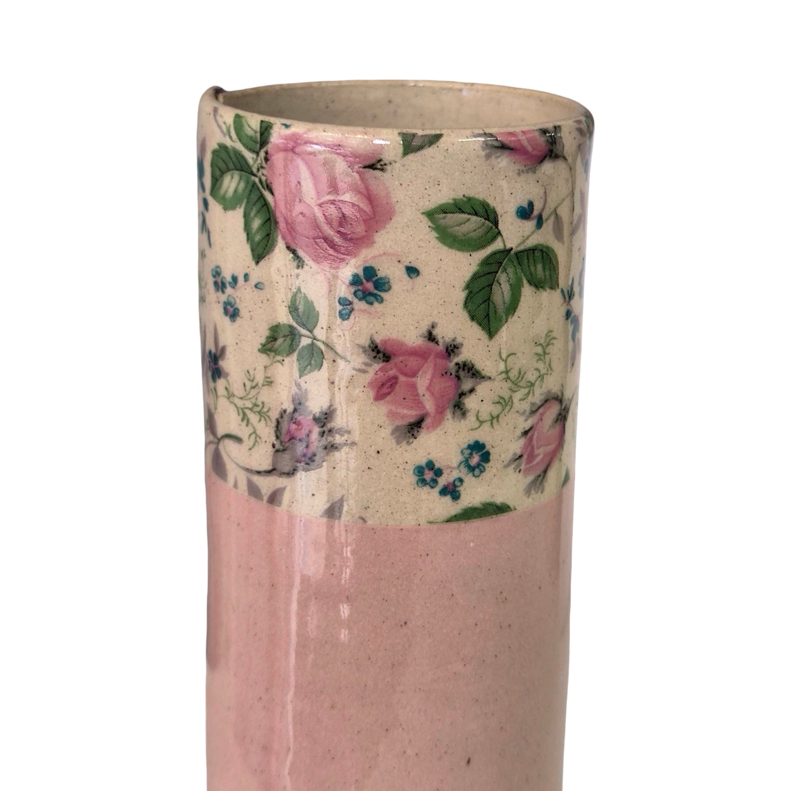 Cylindrical ceramic vase with floral pattern on a white background.