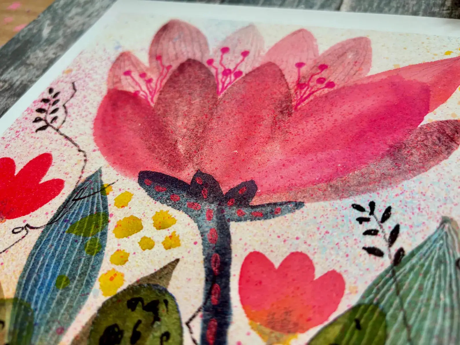 Colourful floral design with pink flowers.