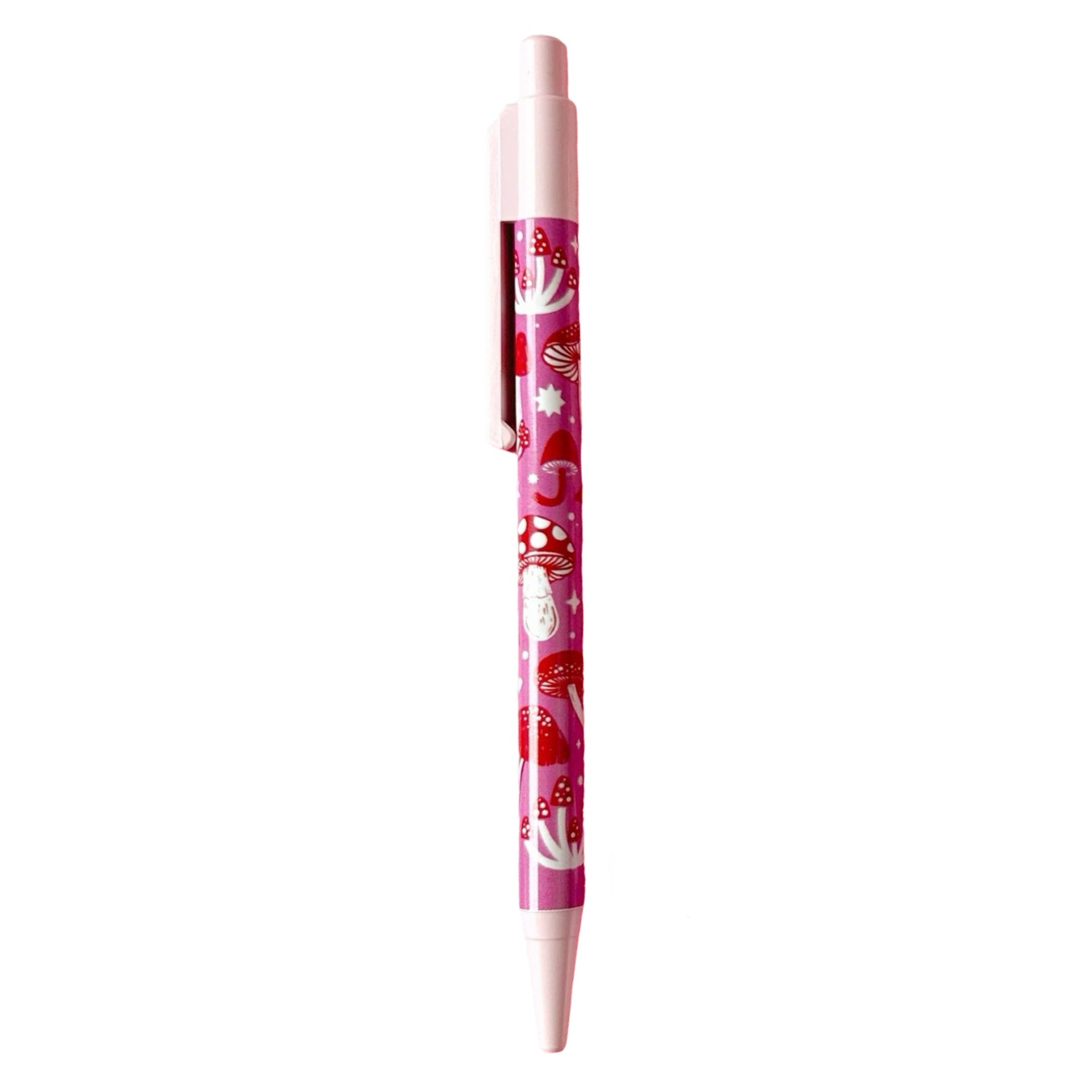 Ballpoint pen with a pink and red mushroom design. 