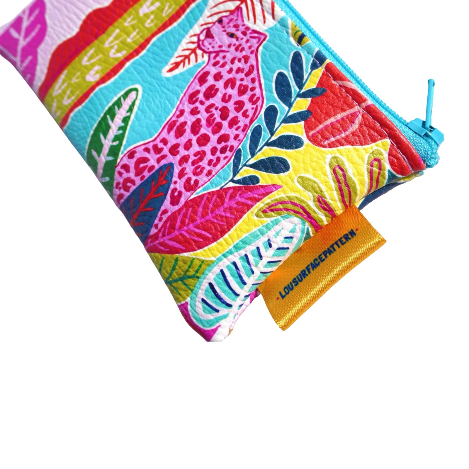 Vegan leather bag with a pink panther surrounded by colourful tropical foliage.