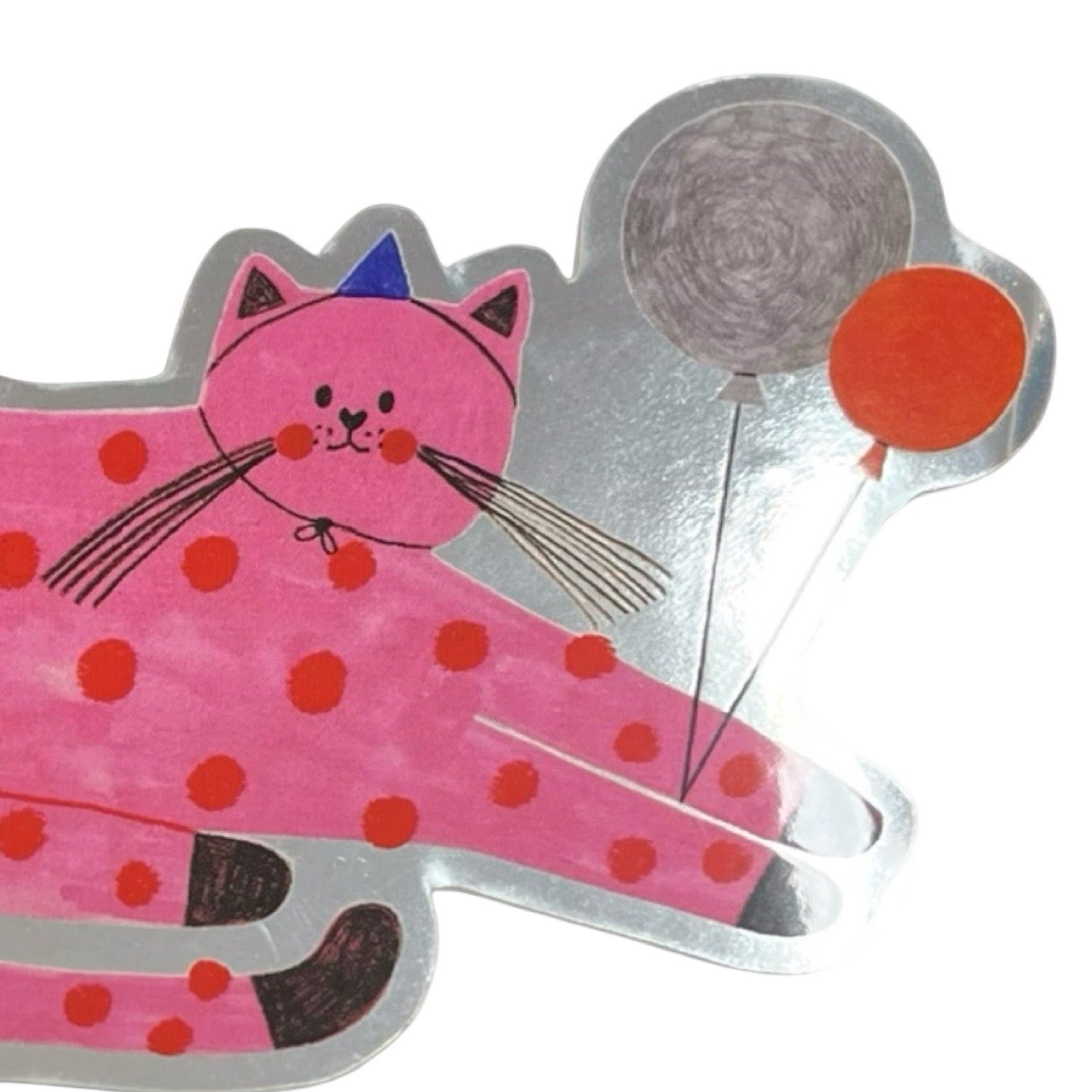 Pink polka dot cat sticker with a balloon on a white background.