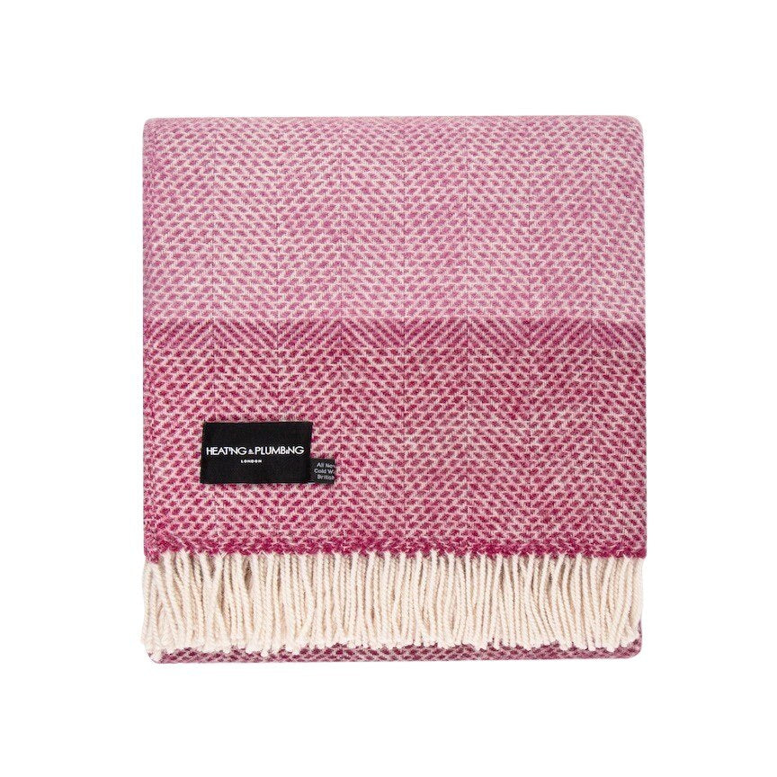 This pink, striped, cosy and fluffy blanket is made from 100% pure new wool and finished with extra brushing to make it exceptionally soft.