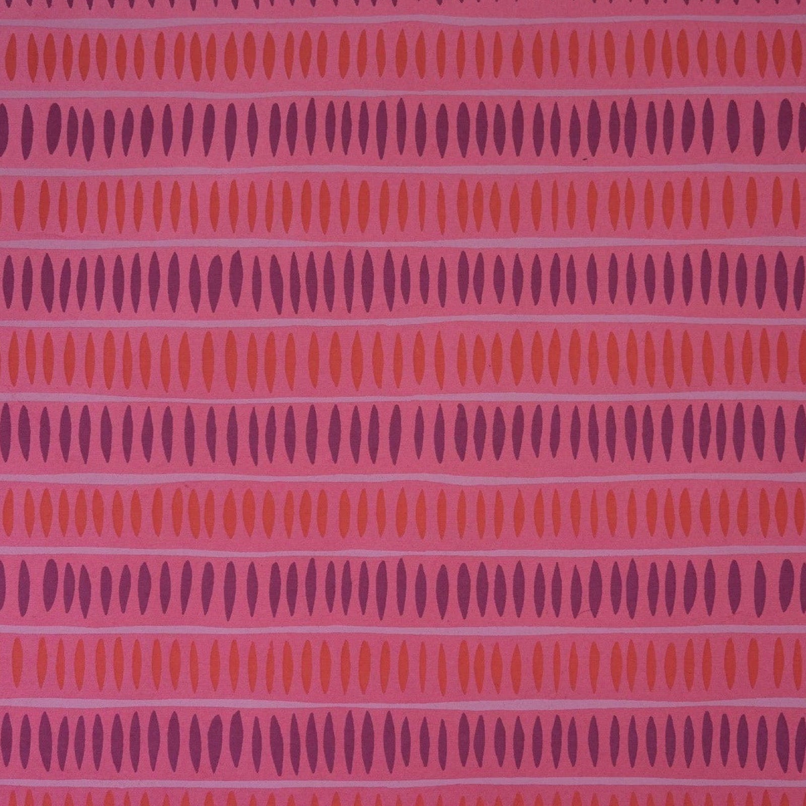 Pink wrapping paper with red and purple dashed stripes.