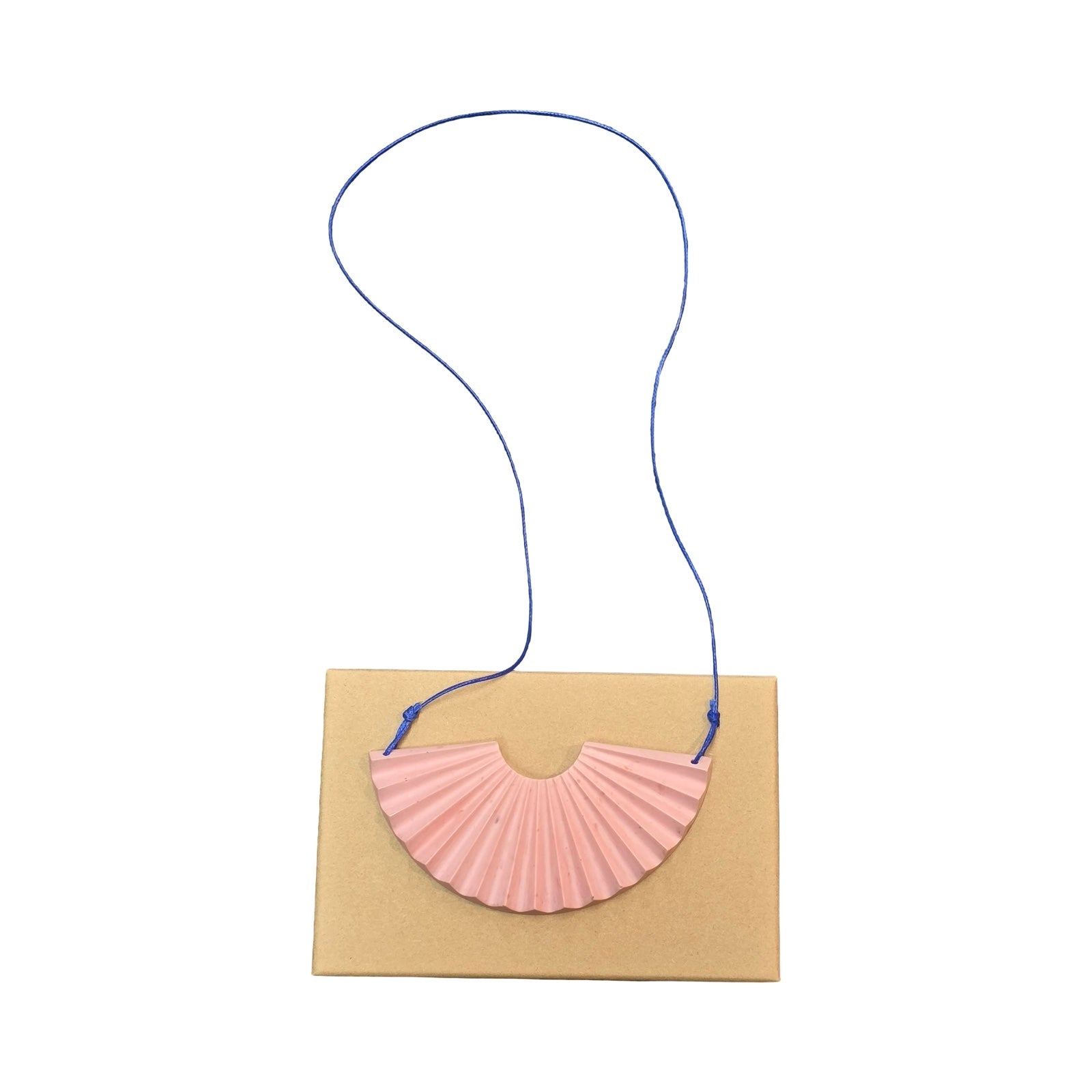 Pink sunshine-shaped necklace.