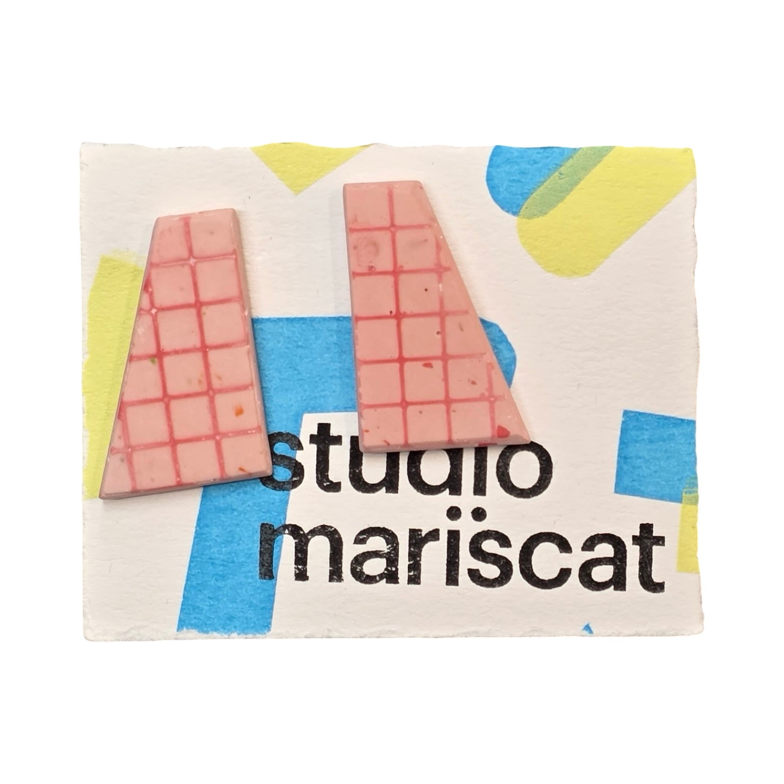 Pink trapezoid-shaped stud earrings with a red grid pattern.