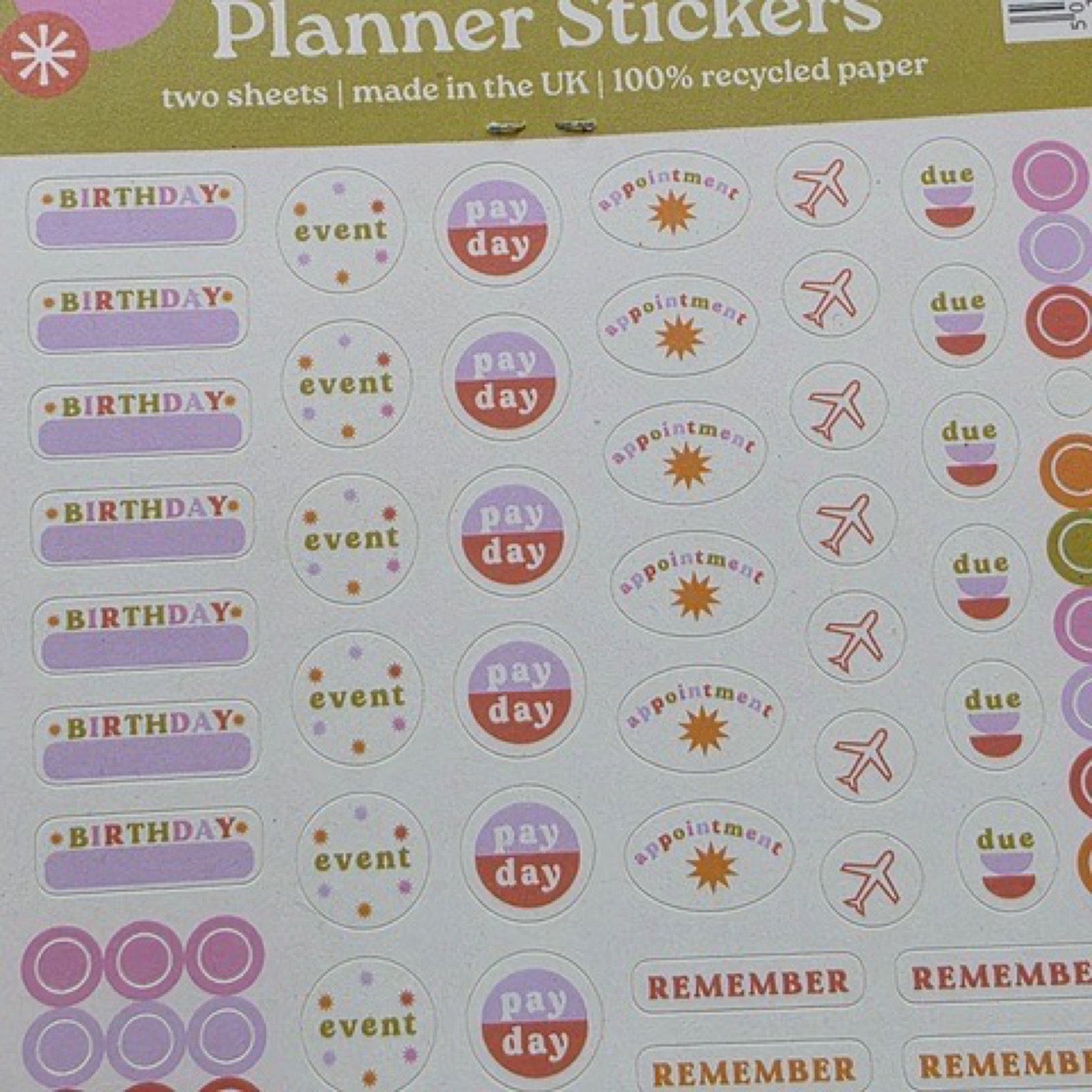 Two sheets of stickers in shades of pink, purple, orange and red  including 'event', 'pay day', 'birthday' and 'remember'.