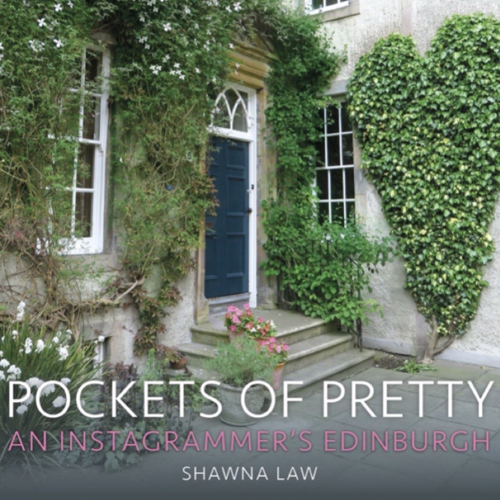 The front cover of Pockets of Pretty showing a house with ivy growing up the outside and shaped into a love heart on one wall.