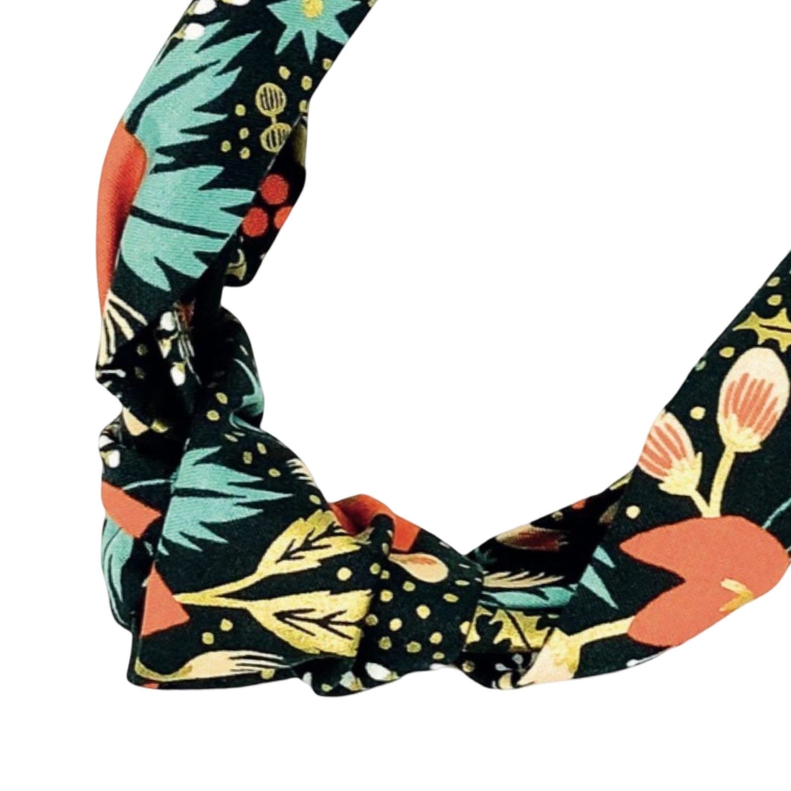 Handmade poinsettia patterned, floral and festive top knotted Alice bands.