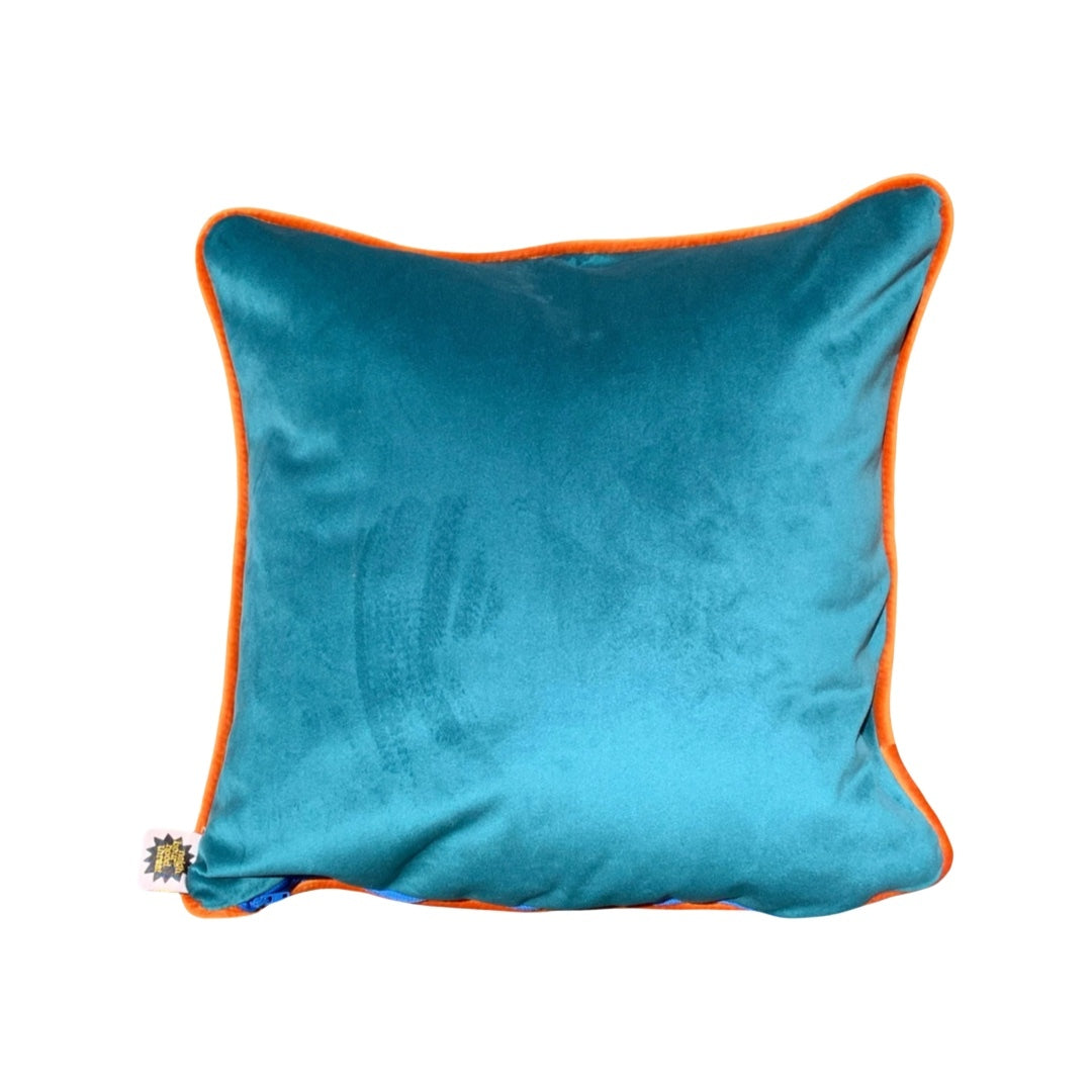 Turquoise velvet back of poochie dog cushion.