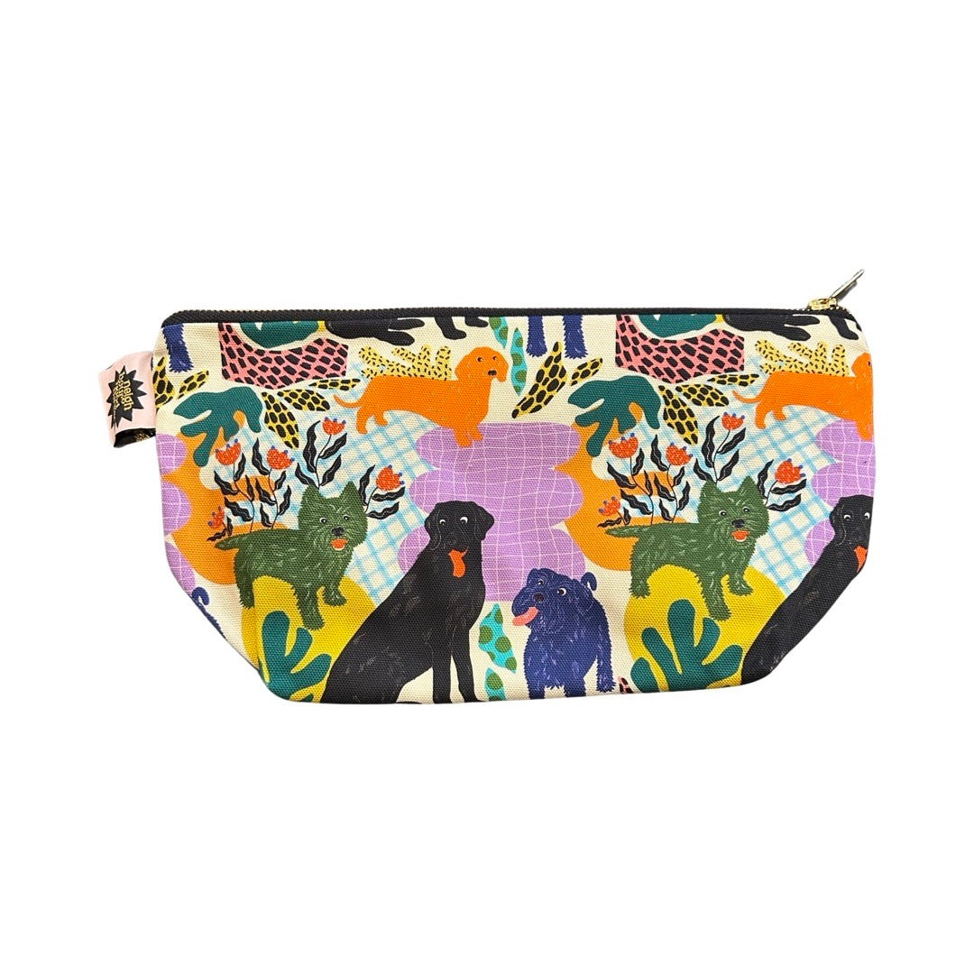 Large zip pouch in poochie fabric featuring black labradors, orange dachshunds and green scottie dogs.