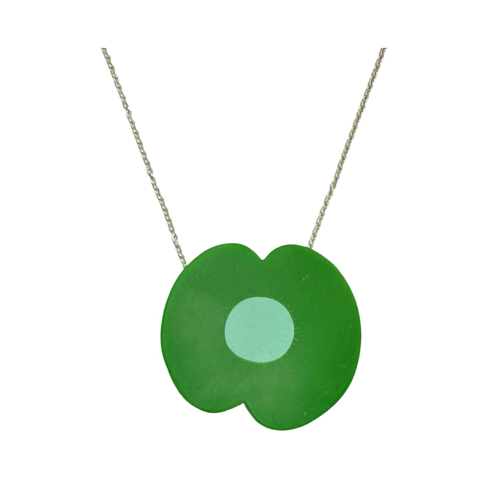 A green resin poppy-shaped necklace with a pale green centre on a silver chain.