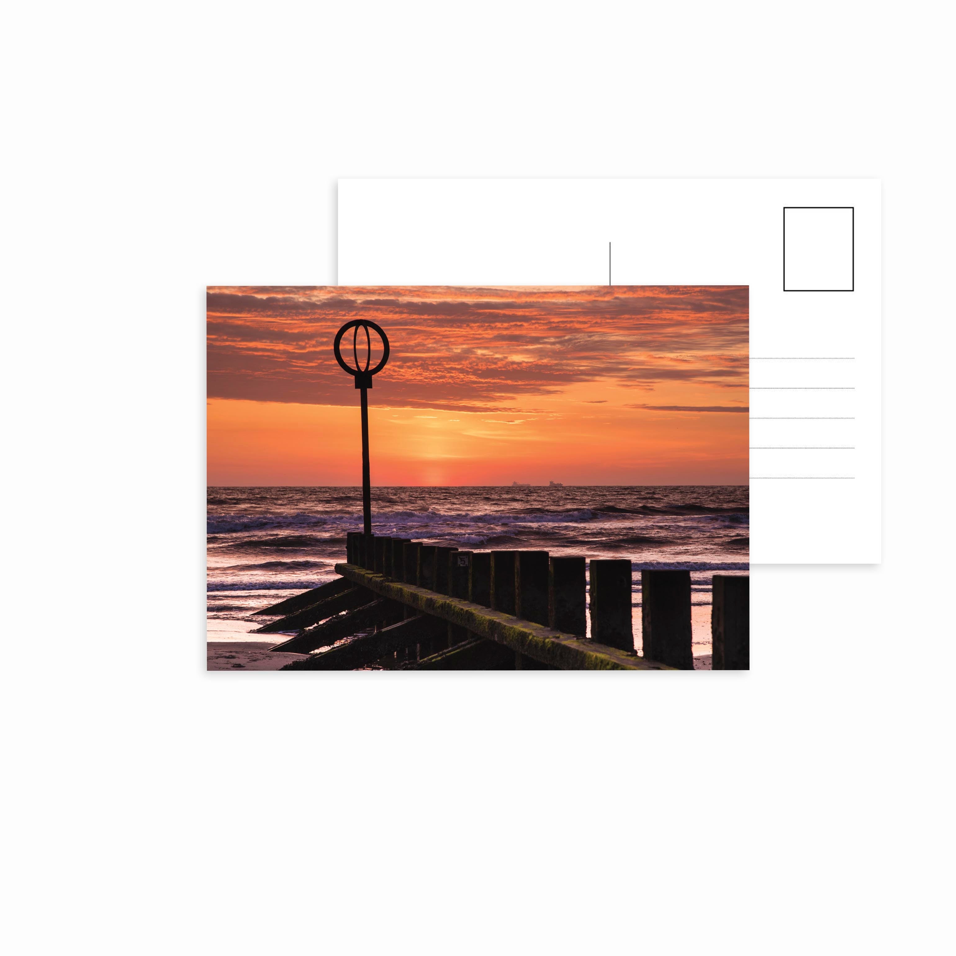 A picture of the sunset on Portobello Beach, Edinburgh on a postcard. 