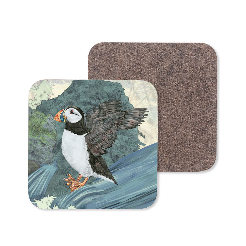 An image of a wooden coaster featuring a puffin in the sea.