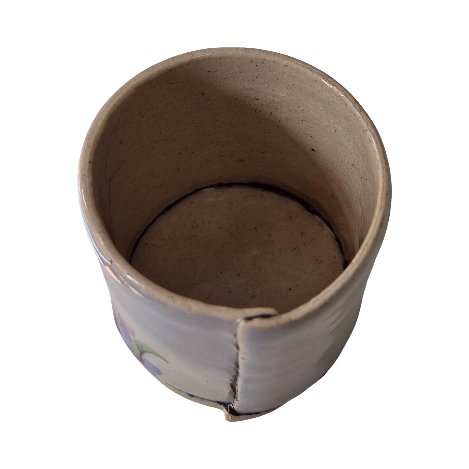 Ceramic planter from above on a white background.