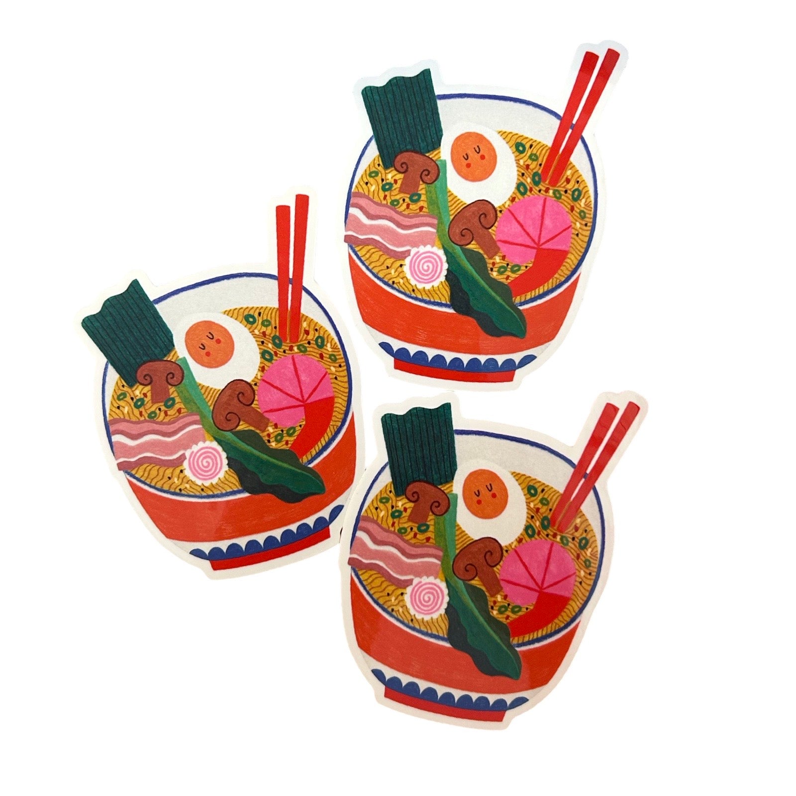 Three illustrated ramen bowl stickers arranged on a plain white background. Each bowl has red-orange rim details, chopsticks, green vegetables, a prawns, brown mushrooms, and an egg.