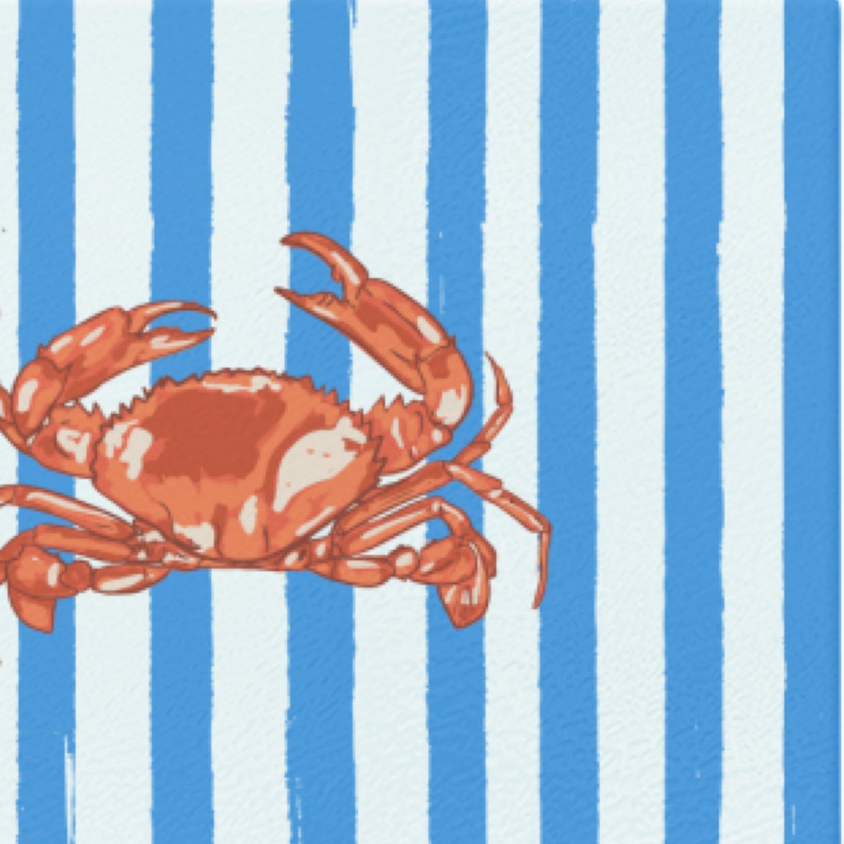 A chopping board with a crab on a background of vertical blue and white stripes.