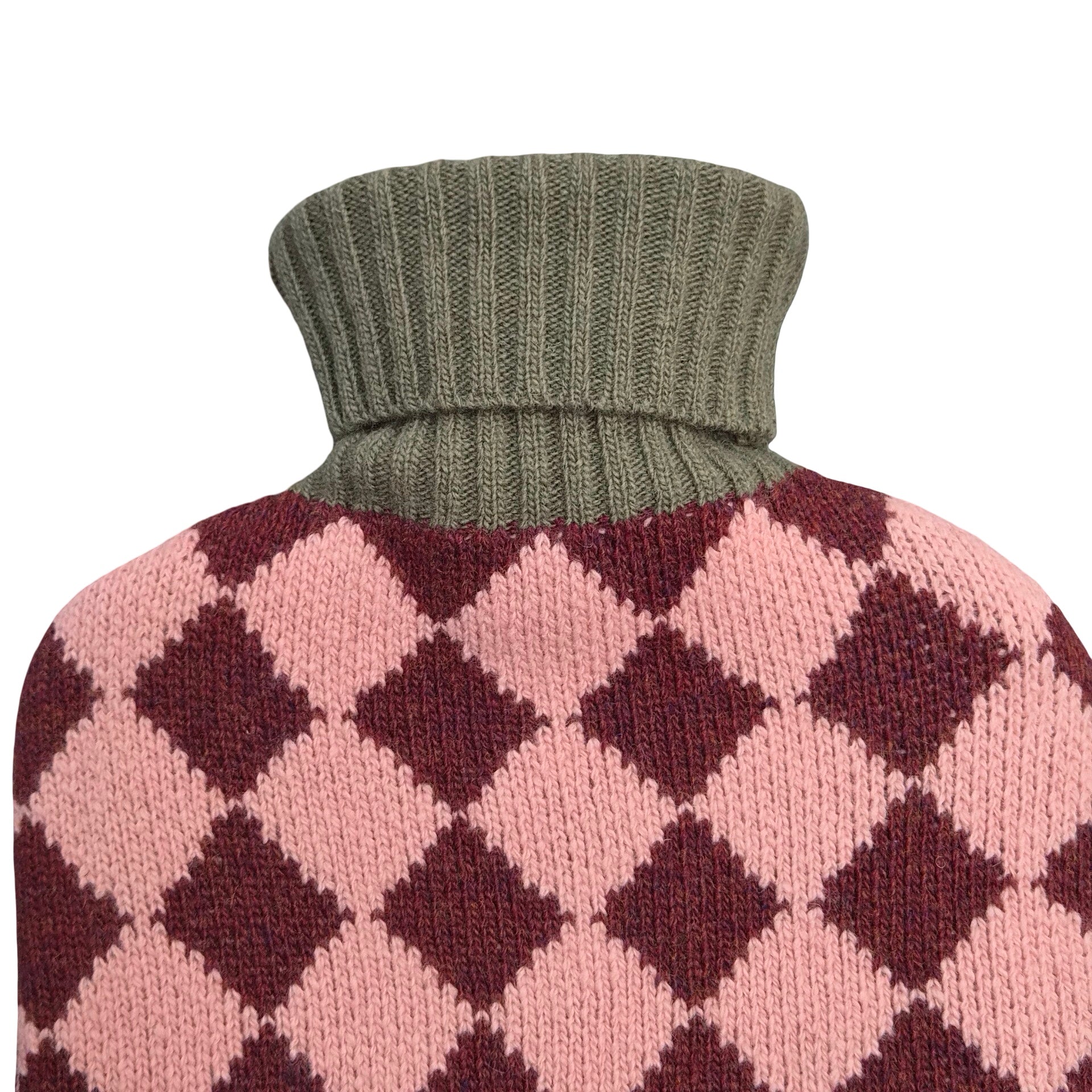 Close-up of a knitted turtleneck hot water bottle with a pink and burgundy argyle pattern and an olive green ribbed collar, shown against a plain white background.