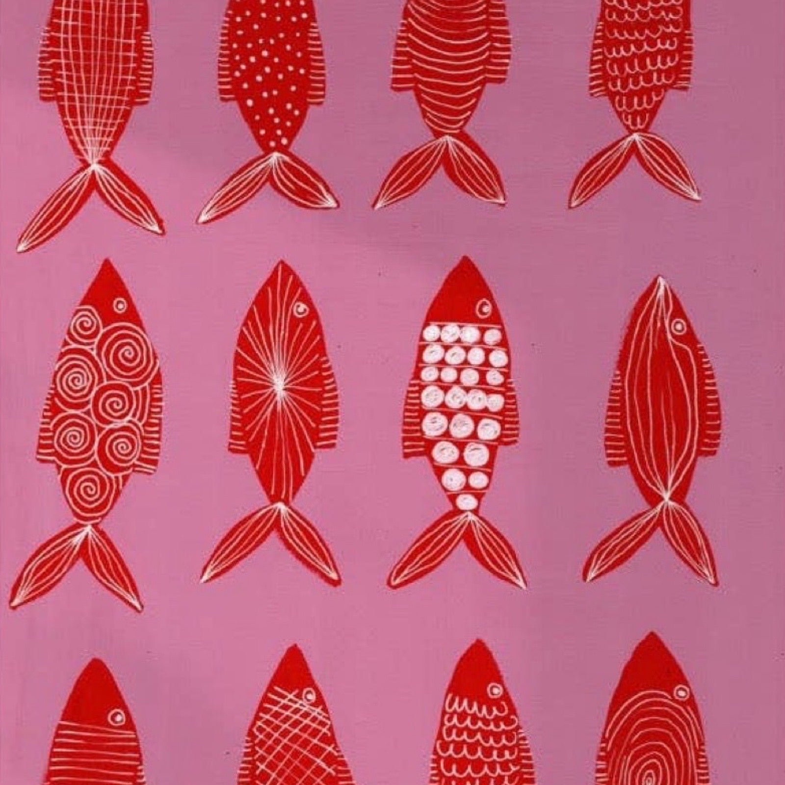 Artwork with red fish illustrations on a pink background.