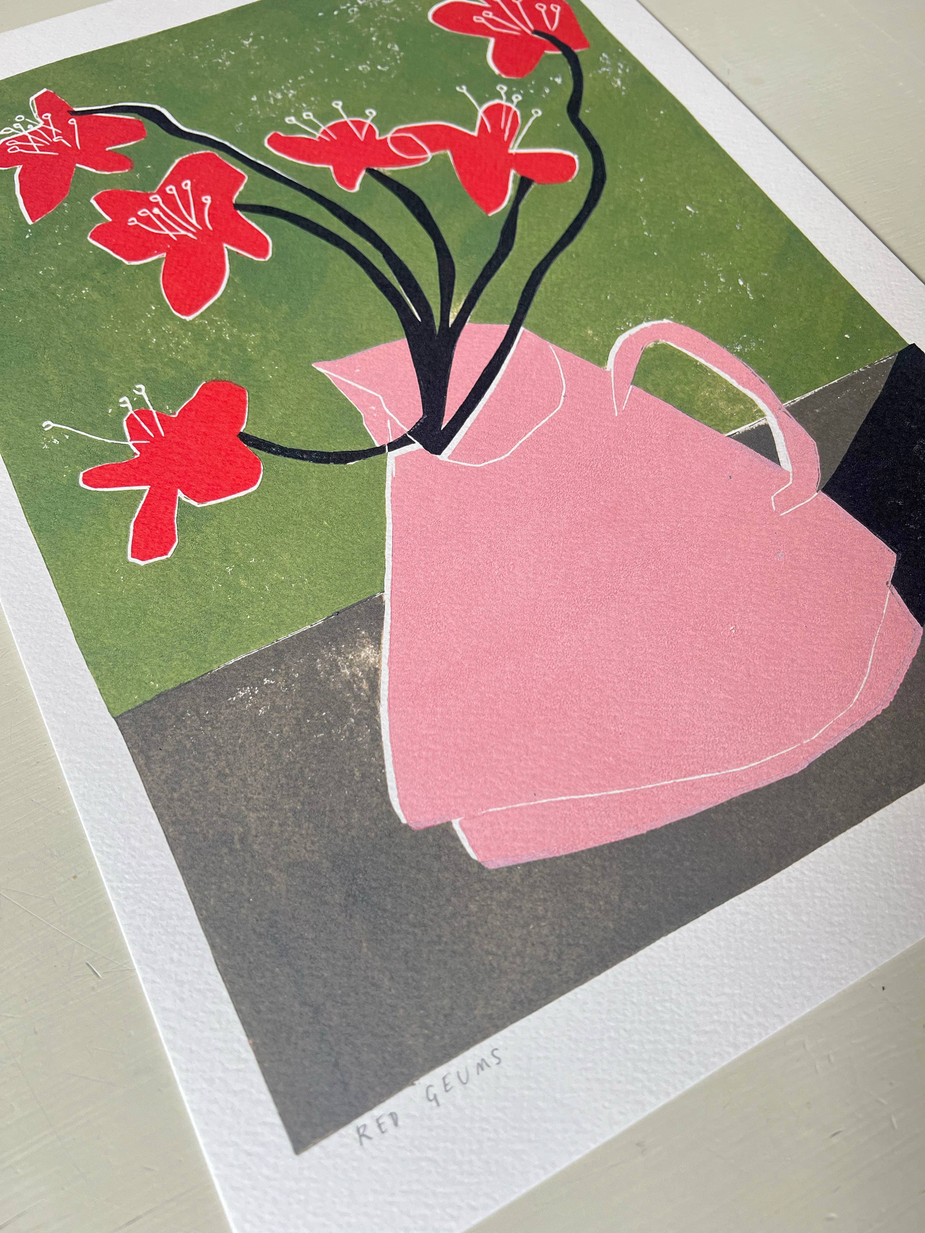 Illustration of a pink teapot with red flowers on a green background.