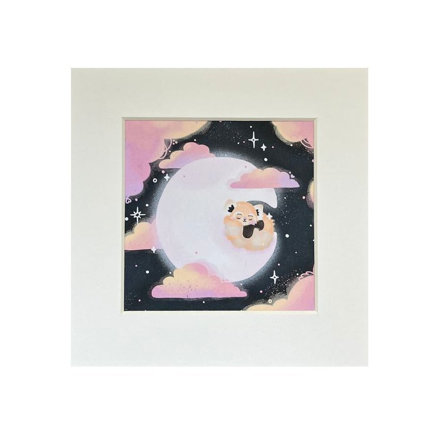 Illustrated print of a red panda sleeping on a crescent moon, with pink clouds around them.