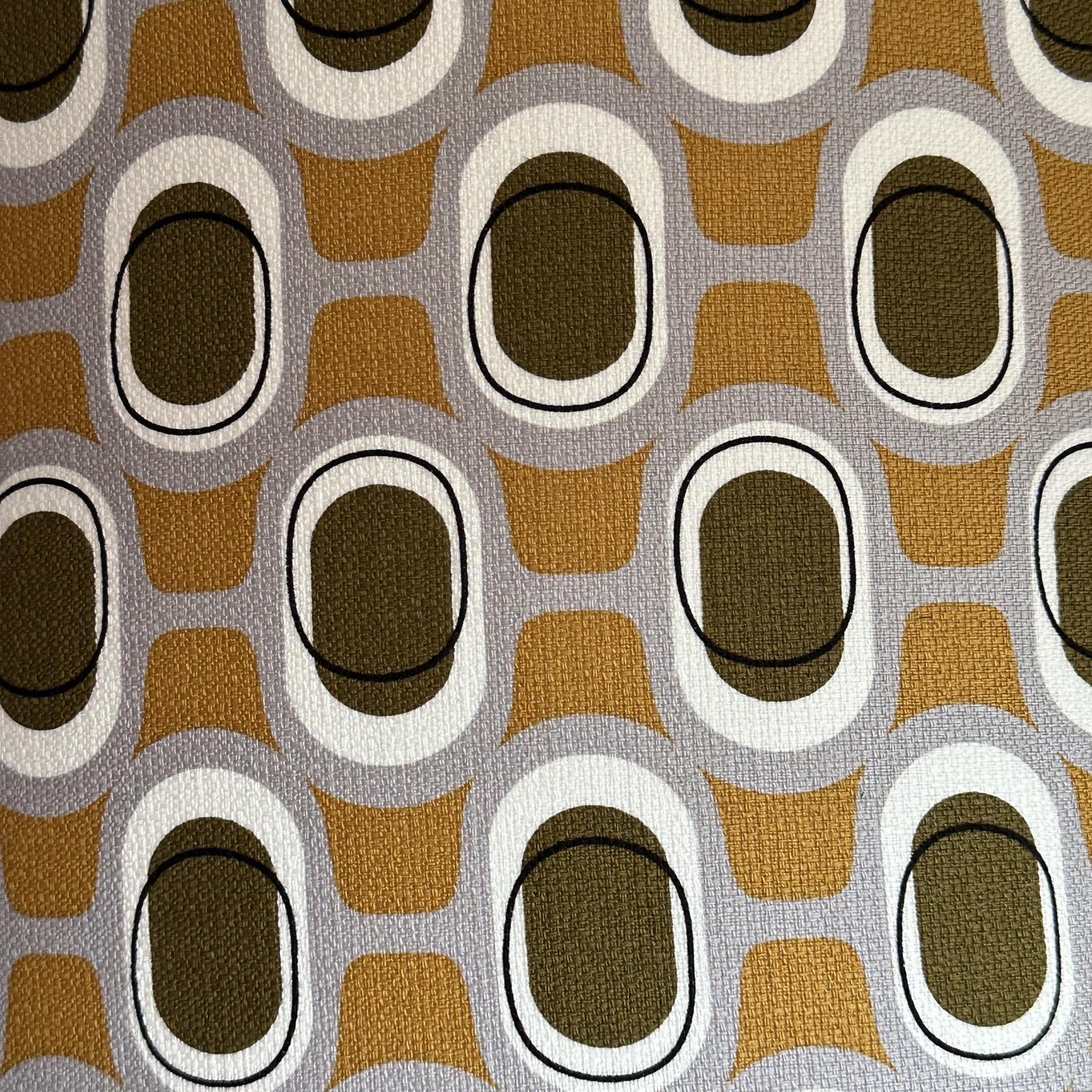 Barkcloth fabric with a mid-century inspired pattern in mustard and brown