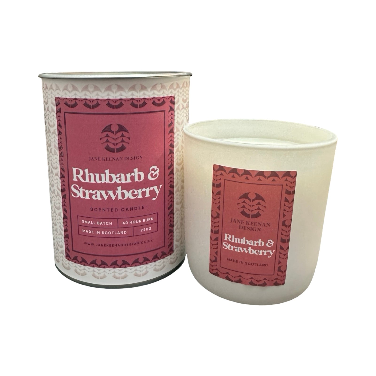 Two candles with 'Rhubarb & Strawberry' label on a white background.
