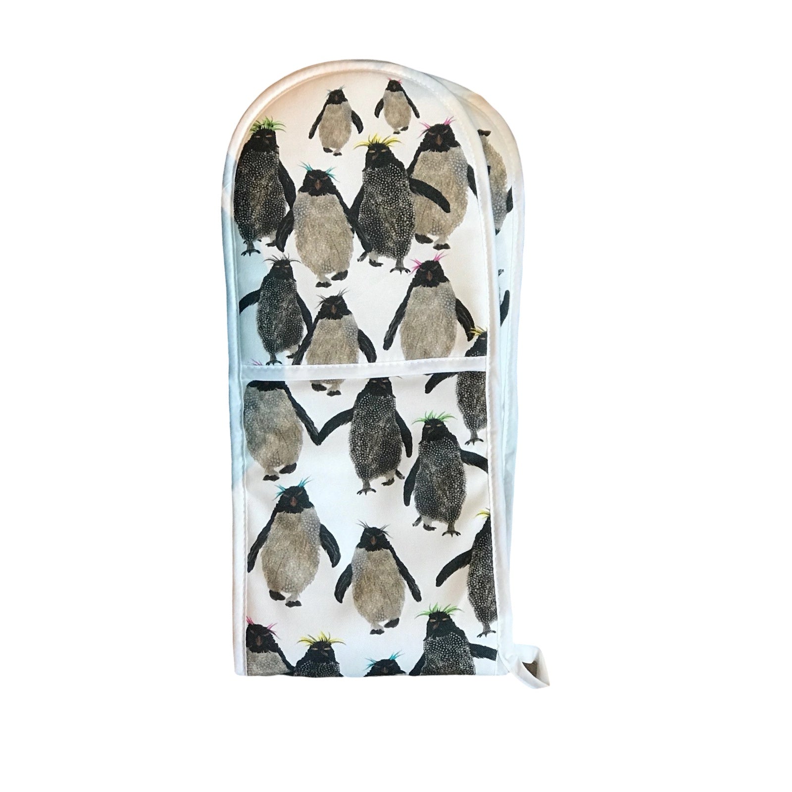 Oven mitt with penguin pattern on a white background.