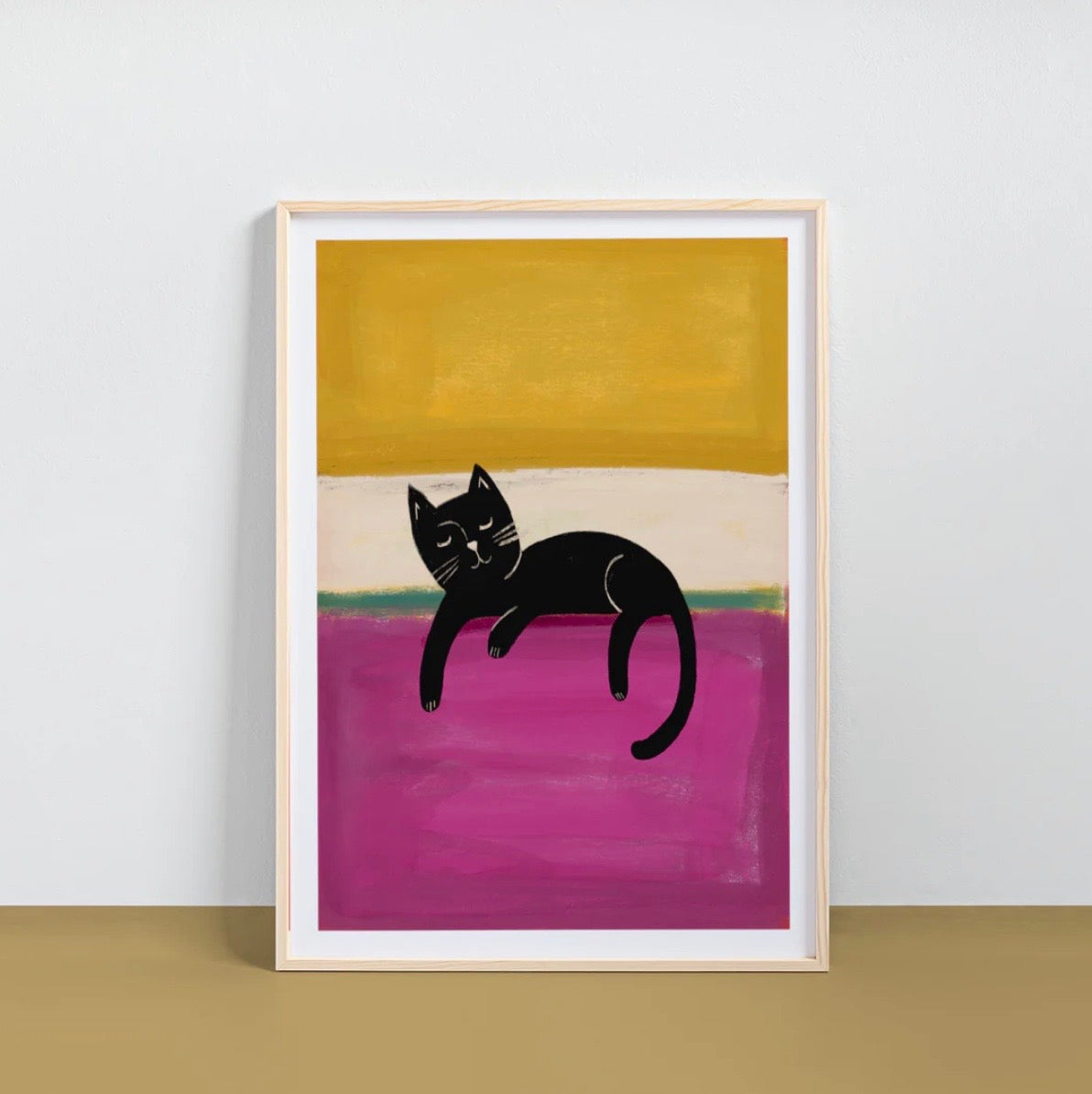 Framed artwork of a black cat on a colourful abstract background.