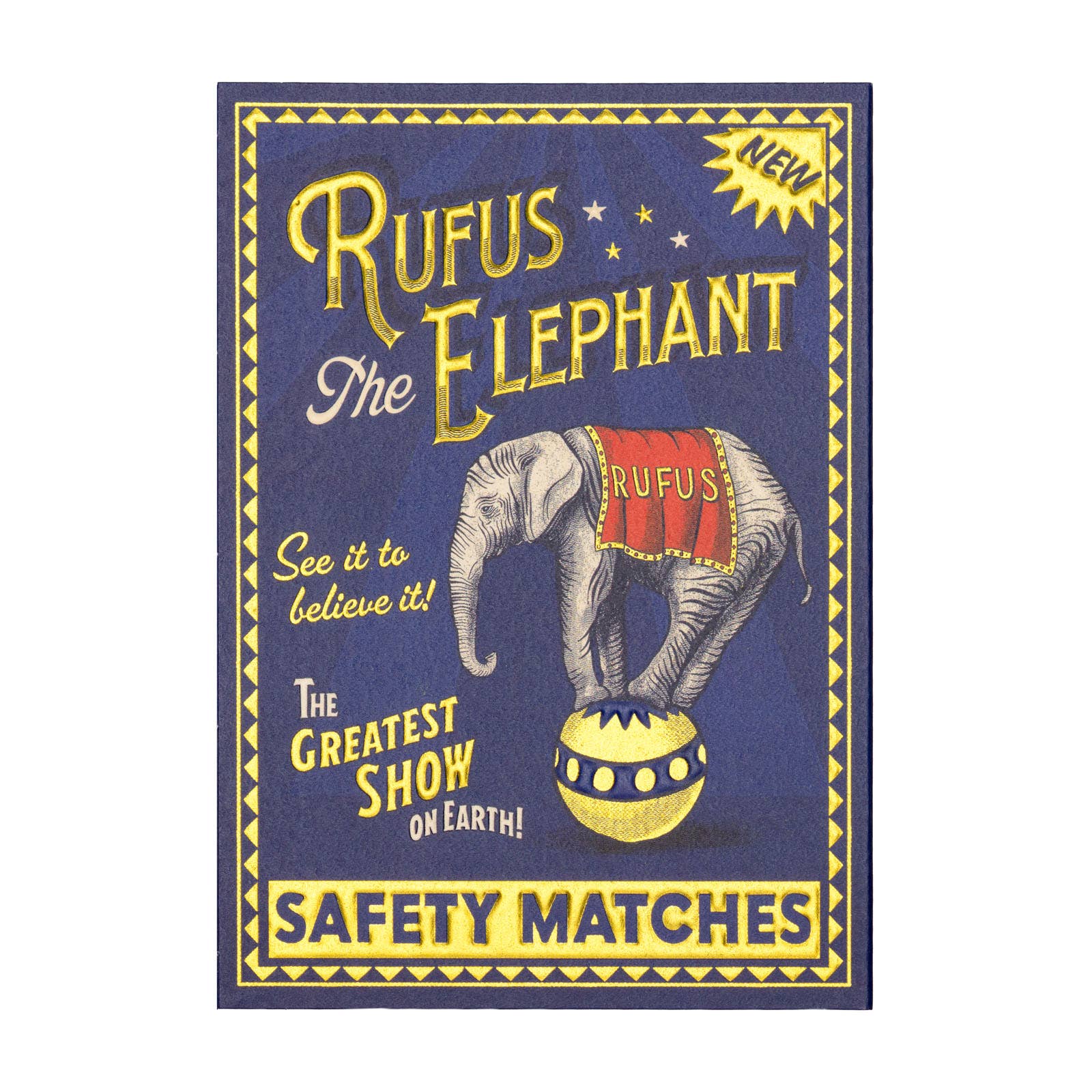 A vintage-style matchbox cover reading 'Rufus the Elephant' with an illustrated elephant balancing on a ball, plus the text 'SAFETY MATCHES' and 'NEW'.