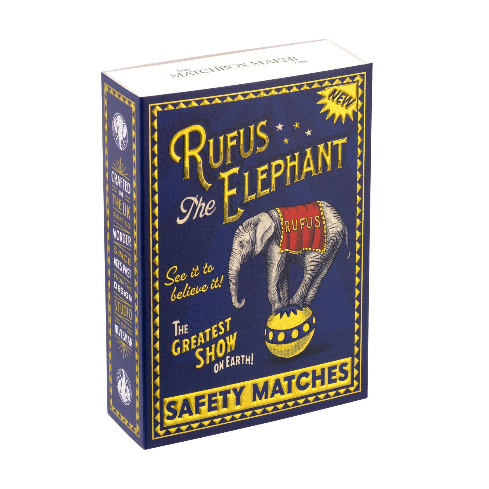 A boxed deck of safety matches branded 'Rufus the Elephant' on a plain white background. The package is dark blue with yellow border details, large yellow title text, and an illustration of an elephant on a large ball.