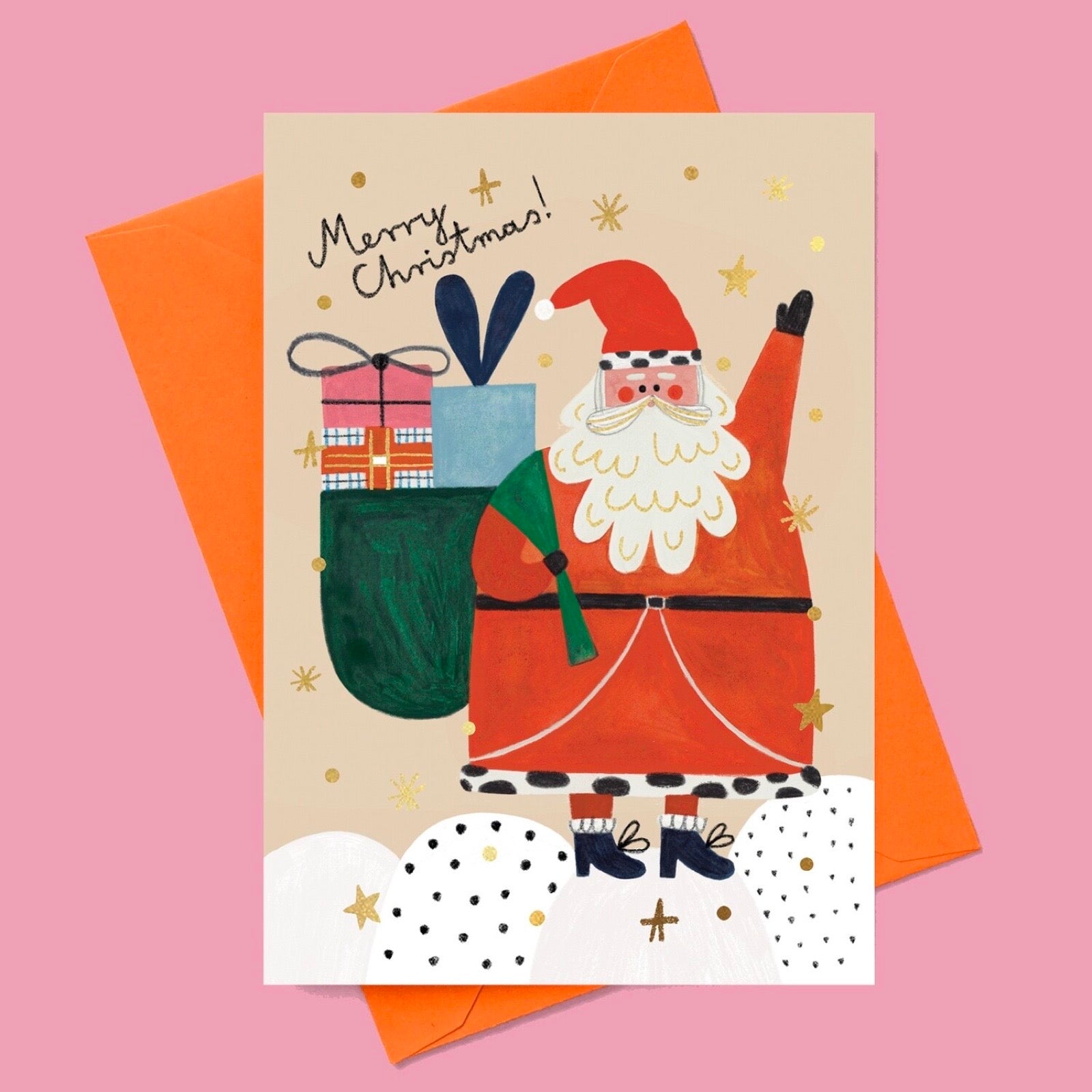 Christmas card with a cartoon Santa Claus holding a sack of presents on a pink background.