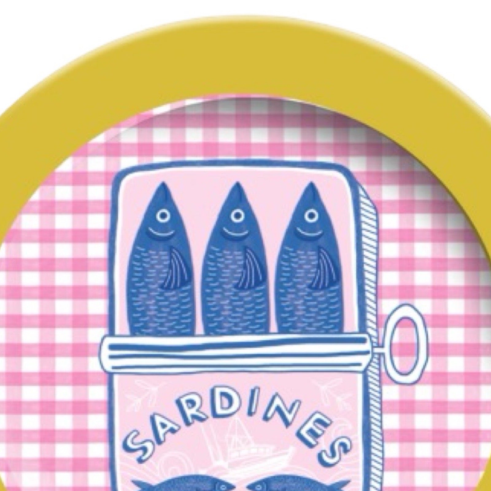 Round plate with yellow rim featuring a design of sardines in a can on a pink checkered background.