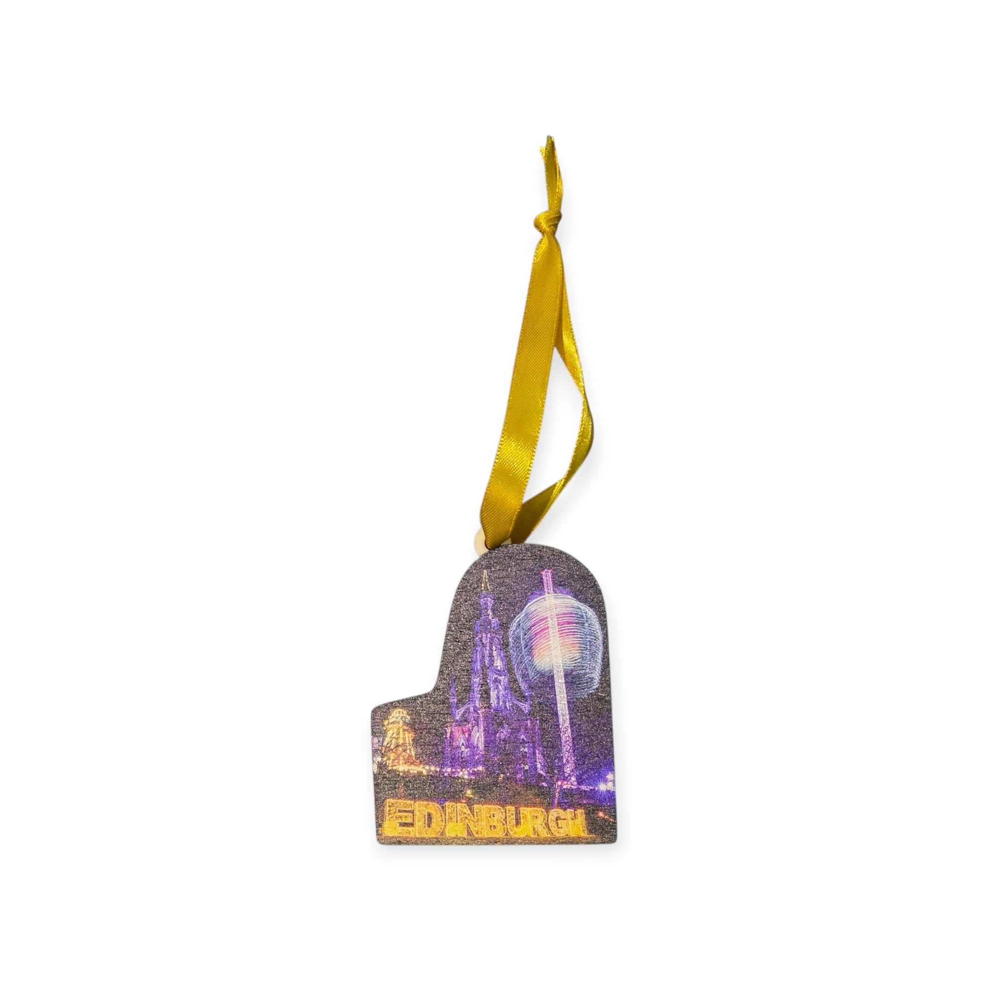 Decorative ornament with Edinburgh skyline and illuminated tower on a white background
