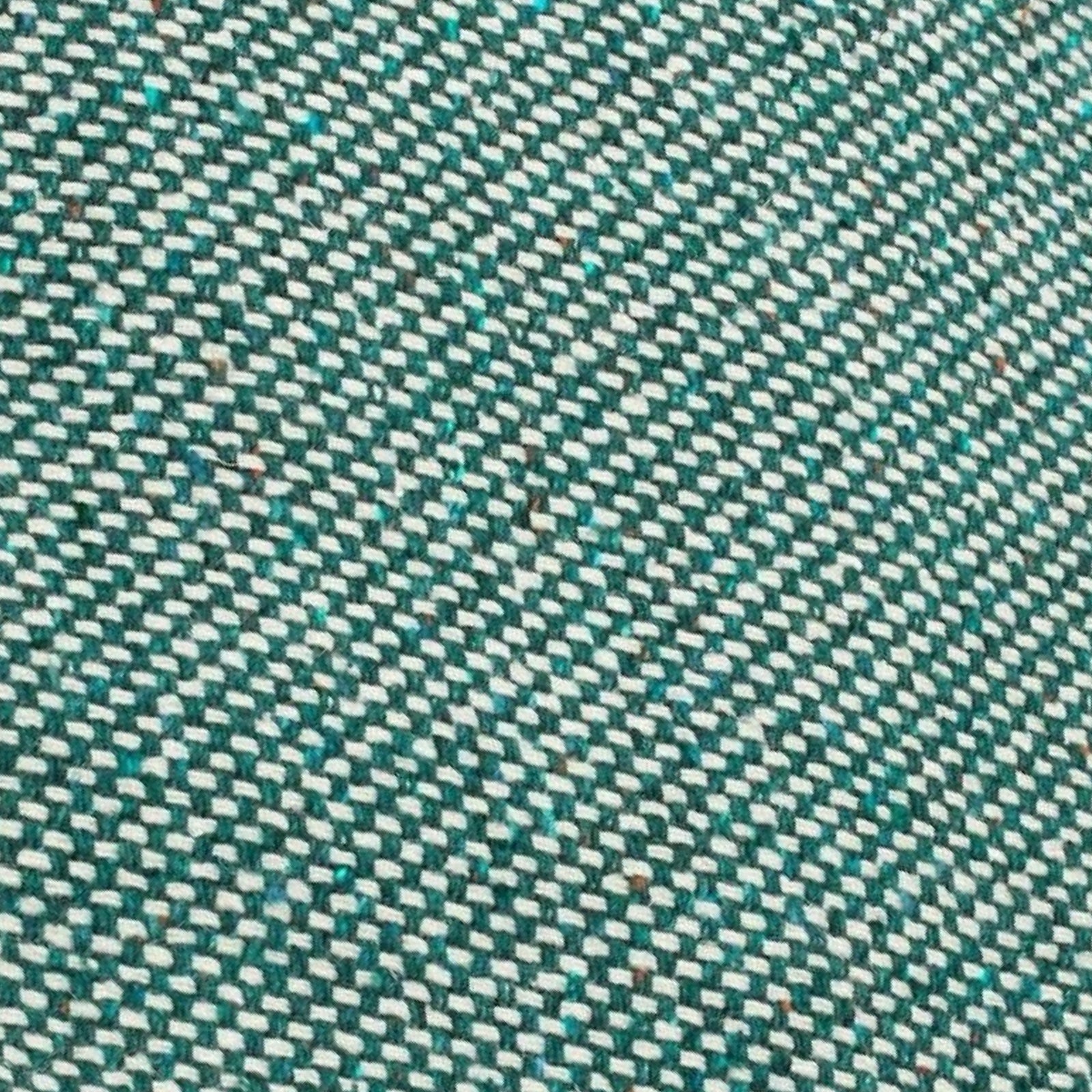 Cosy green blanket close up.