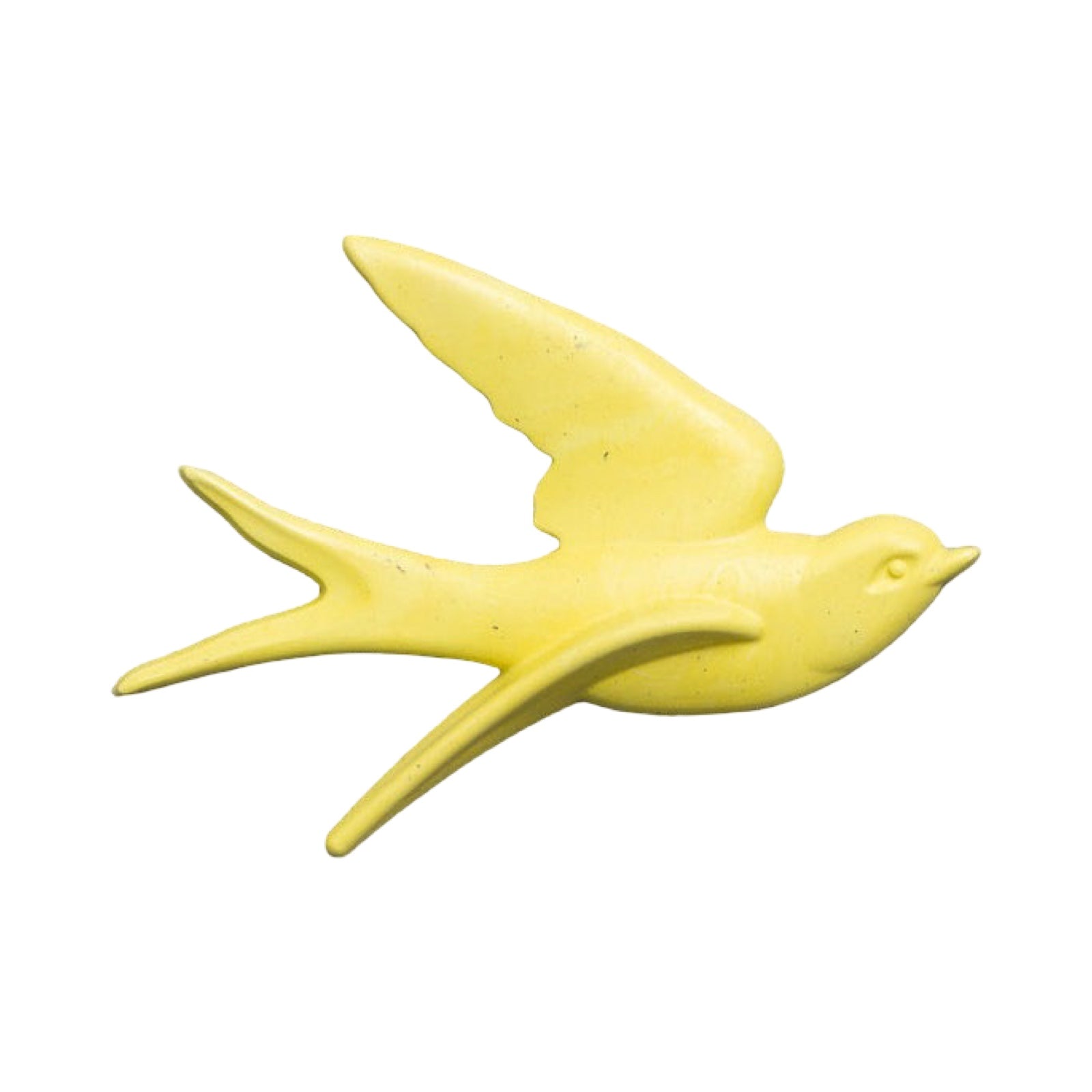 Yellow bird-shaped object on a white background.