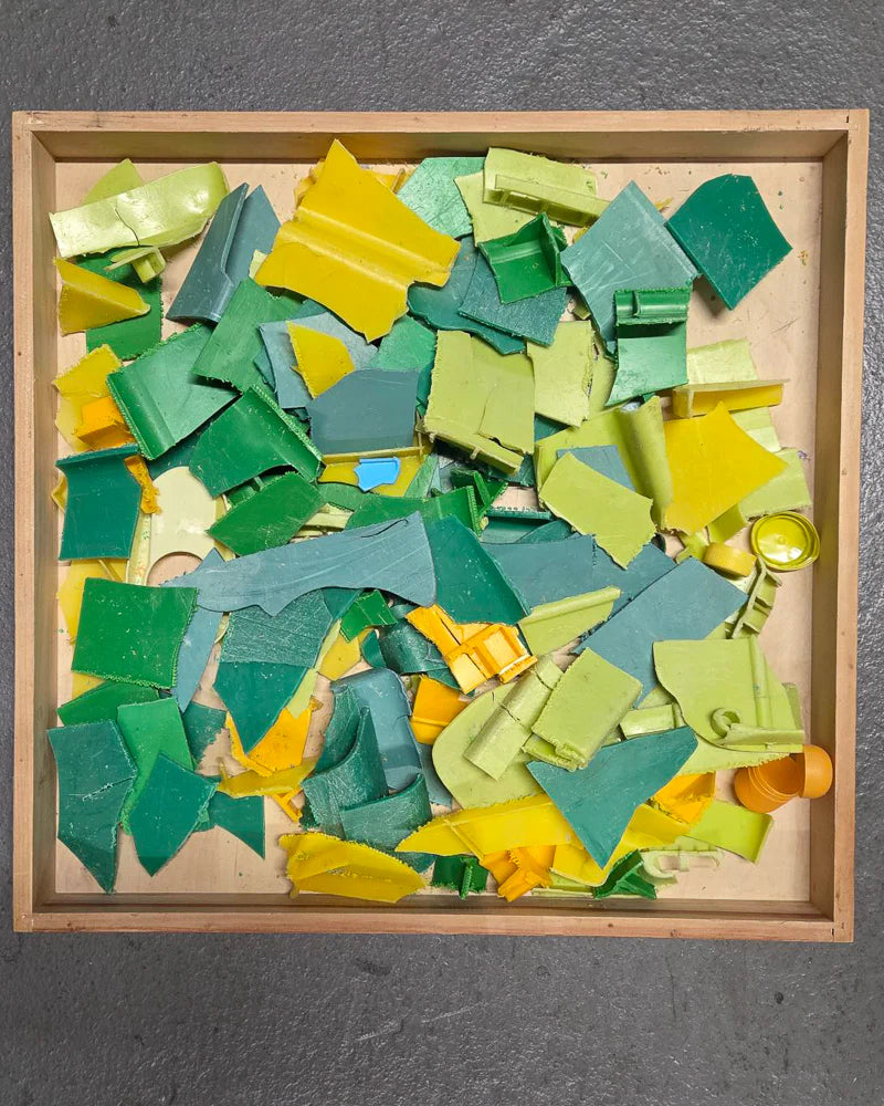 Plastics in a wooden box.