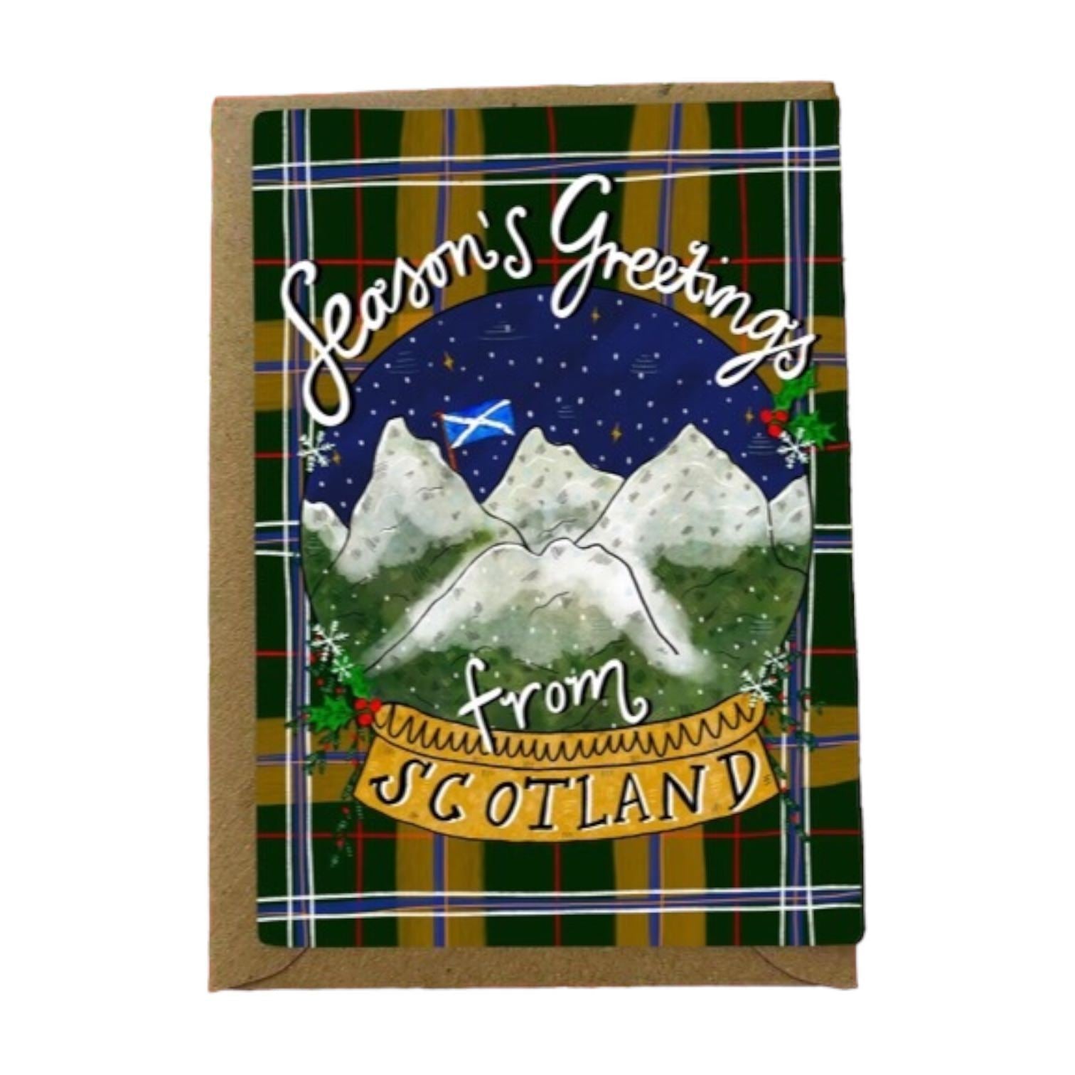 Christmas card with the text 'Seasons Greetings from Scotland' written around an illustrated snowy mountain scene on a green and brown tartan background.