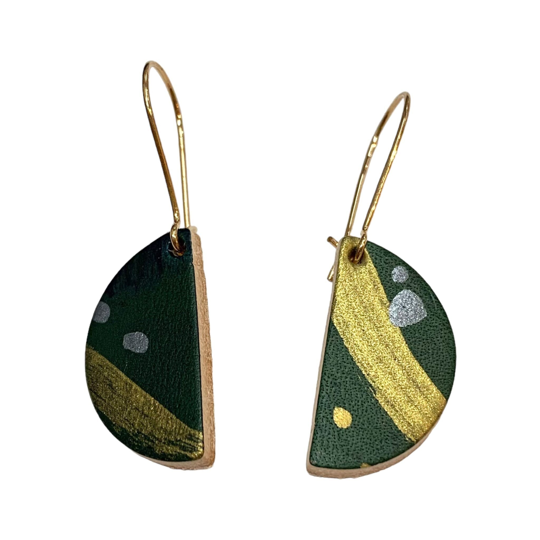 These semi circle drop earrings are crafted with hand-painted lightweight leather.