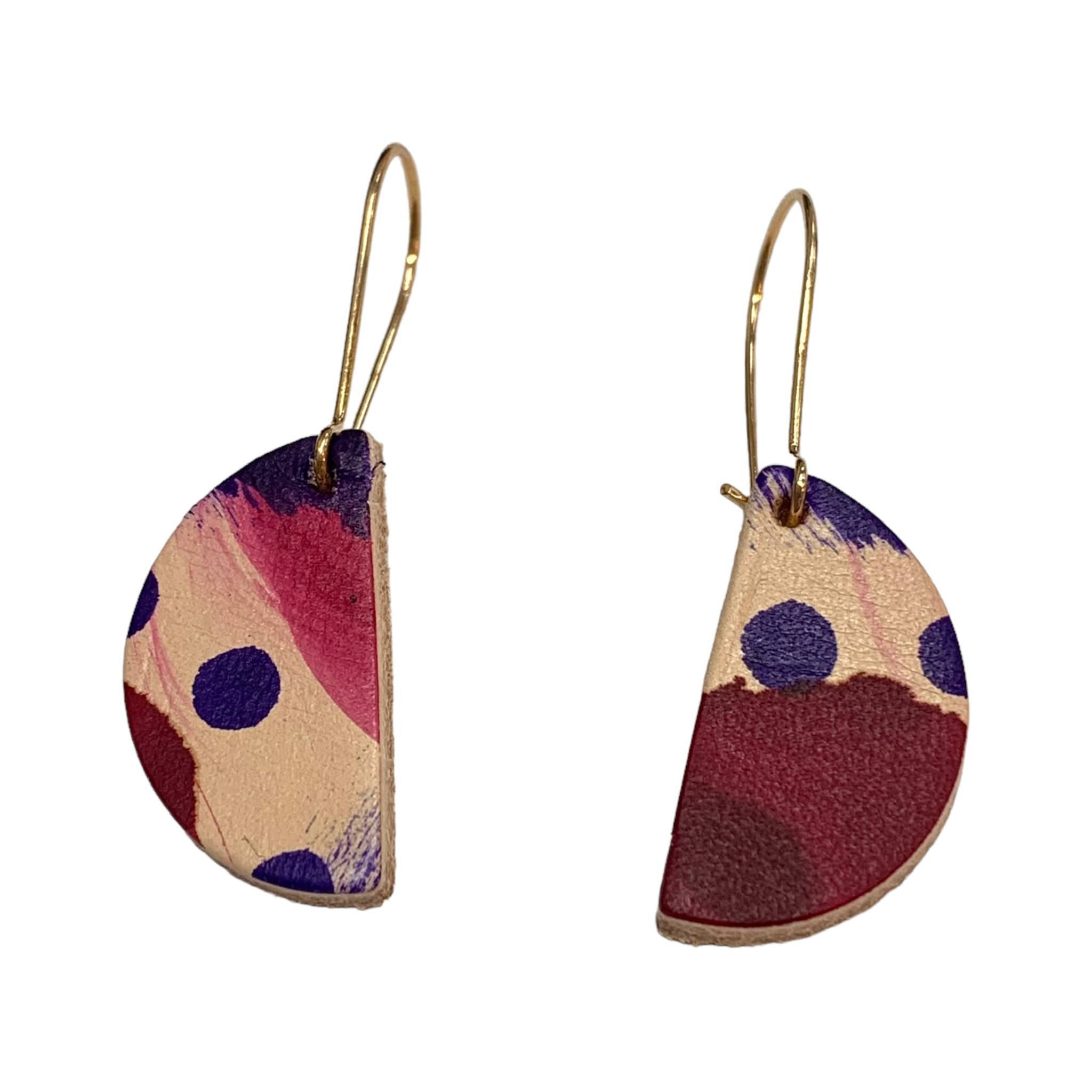 These semi circle drop earrings are crafted with hand-painted lightweight leather.