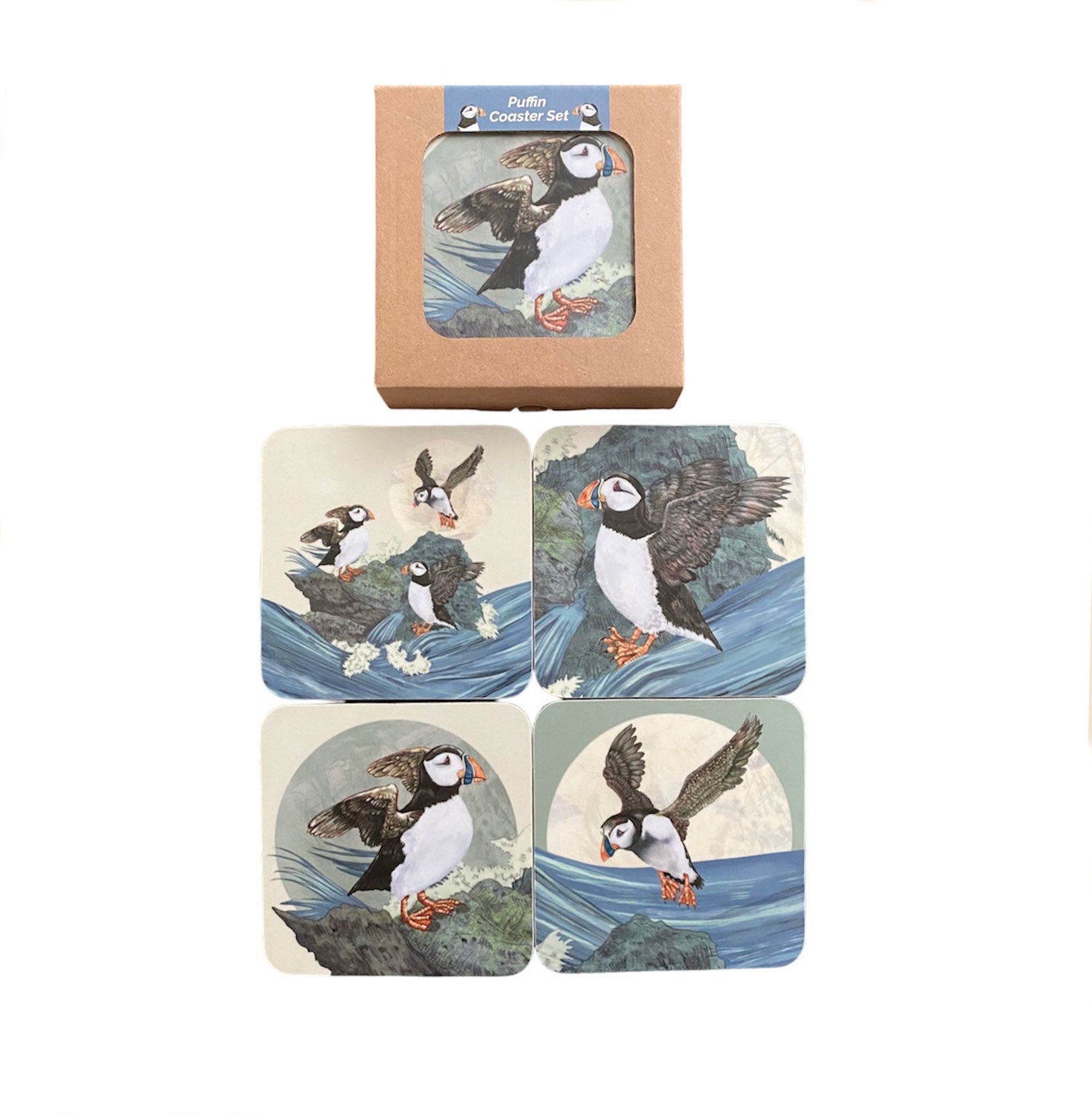 An image of a boxed coaster set with four puffin designs.