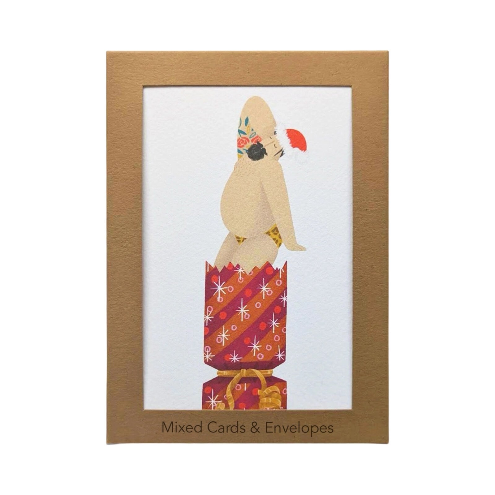 Sexy man Christmas card pack featuring a man in lepoard underwear coming out of a cracker.