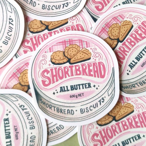 Sticker featuring an illustration of a tin of all-butter shortbread.