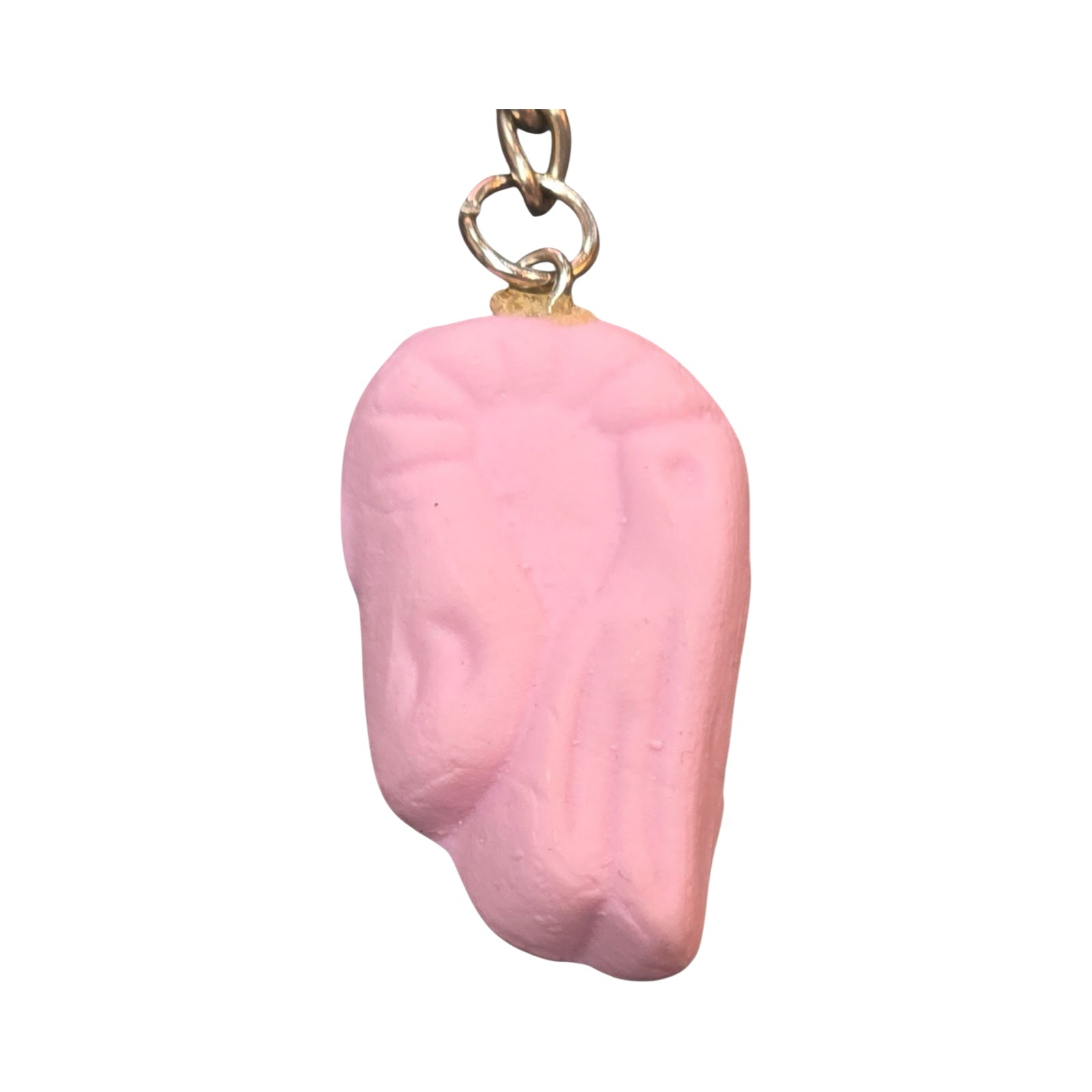 A fun keyring in the shape of a foam shrimp sweet made from polymer clay.