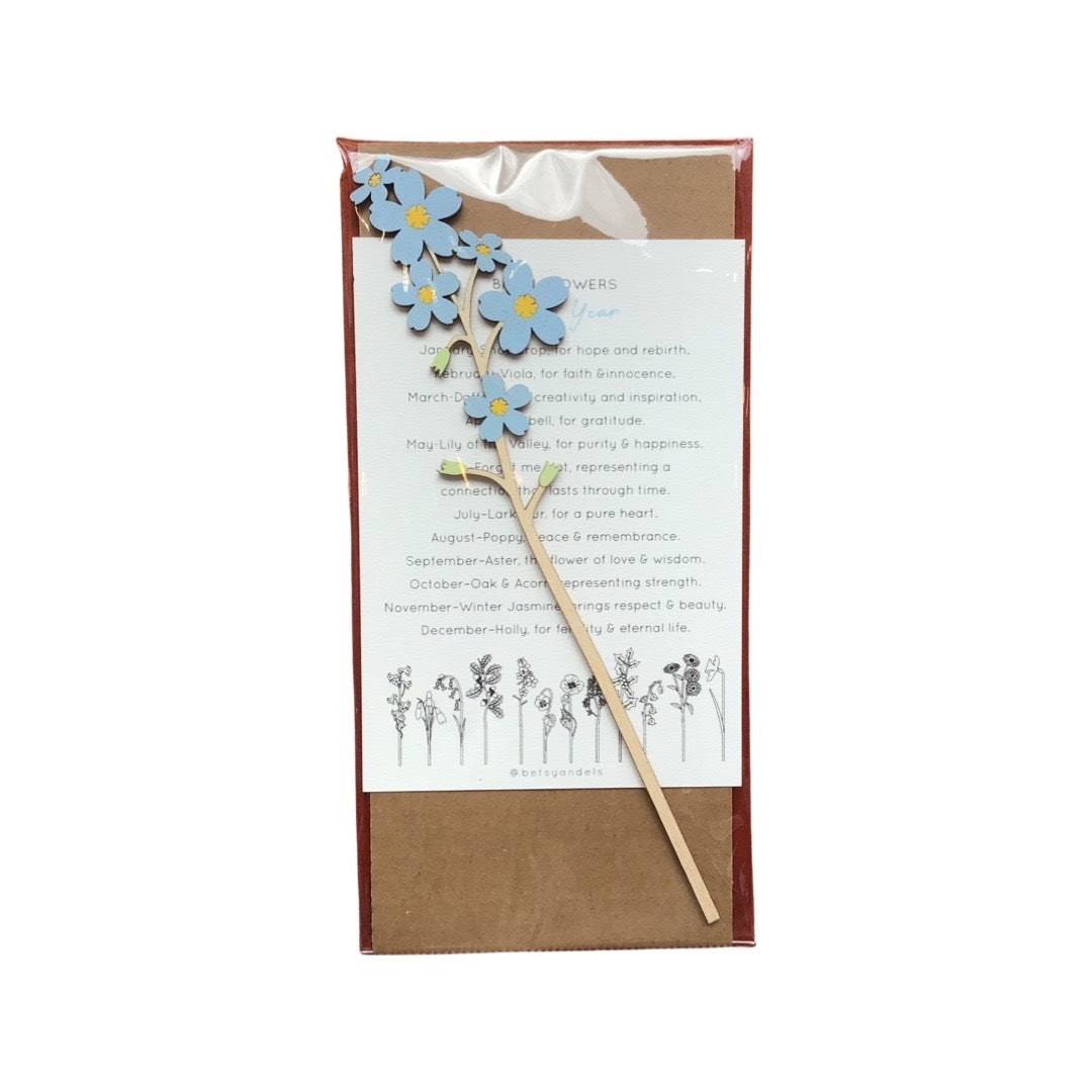 Packaged single forget-me-not wooden stem with blue flowers